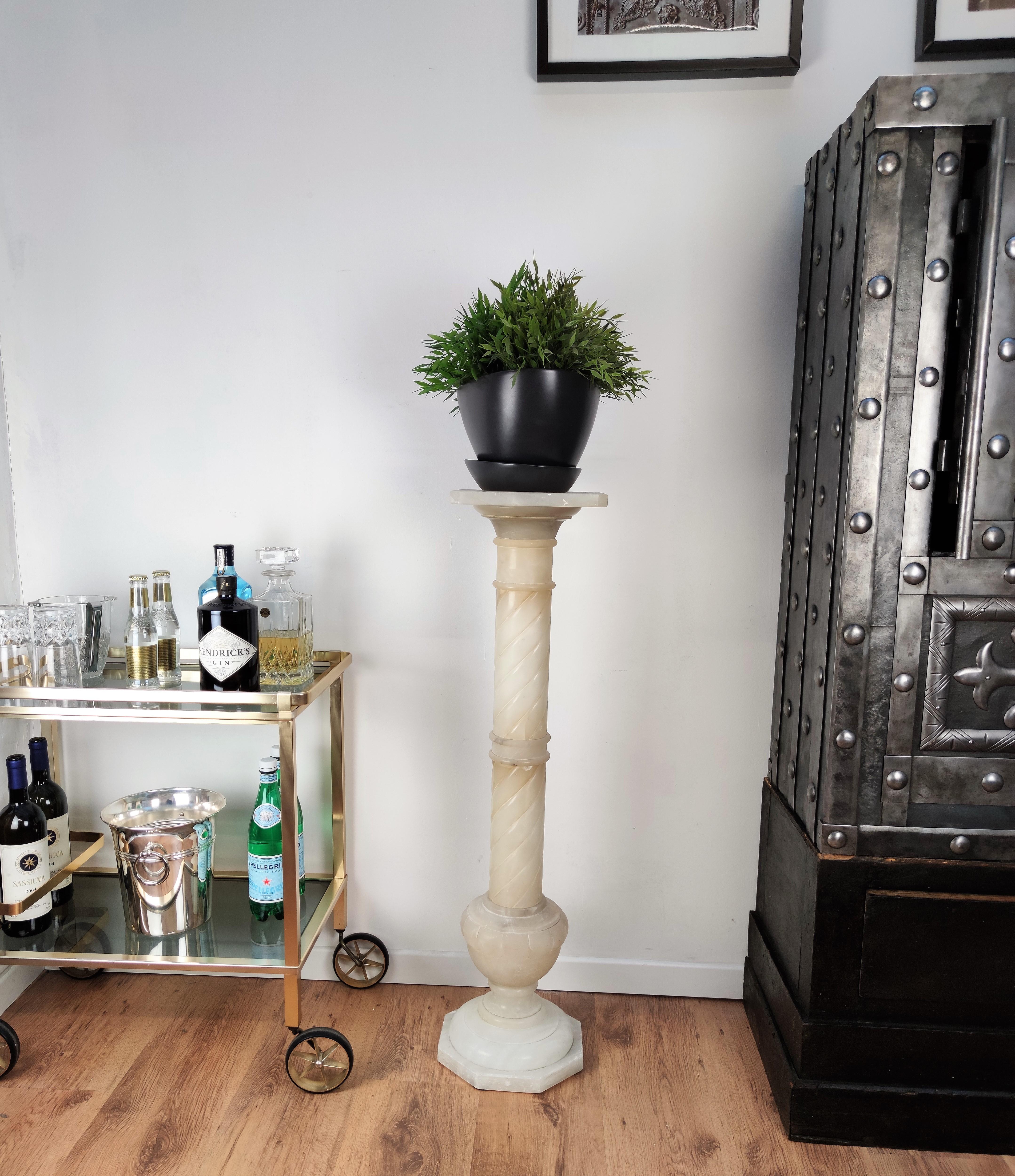 Beautifully carved and shaped, stylish Italian white Volterra Alabaster pedestal table or flower pot stand with various decors and shapes giving a modern touch to a classical piece and materials.
 
Since ancient times, the people of central Italy