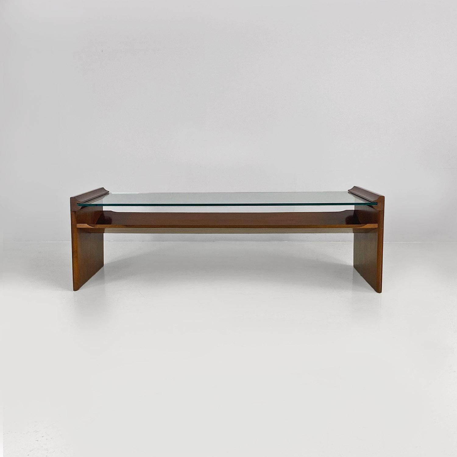 Italian mid century modern wood and glass Acca coffee table by Kazuhide Takahama for Gavina, 1960s.
Acca model coffee table with a rectangular wooden structure, with shaped details and grooves inside the sides where the sea green glass top is