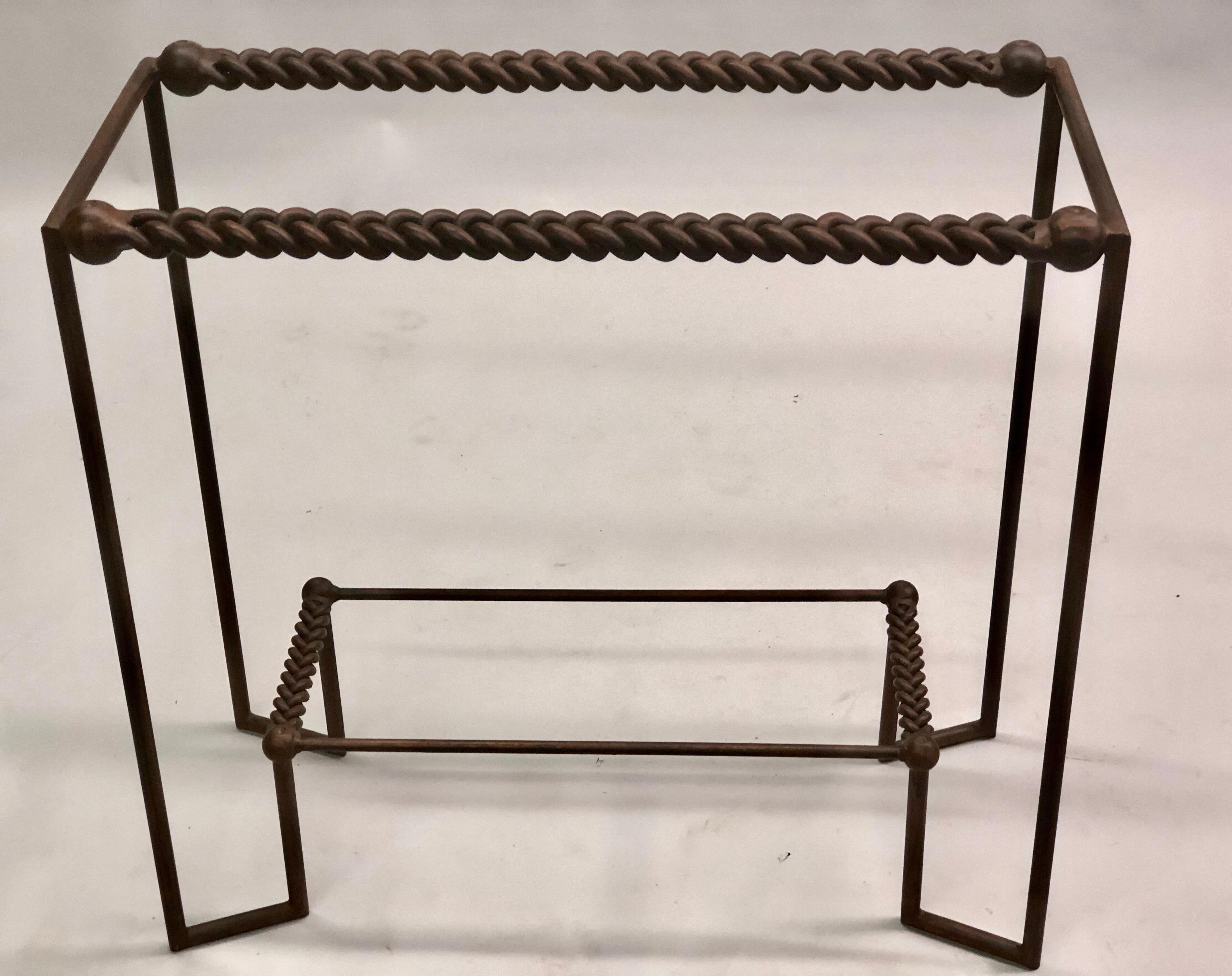 A Rare and Elegant Italian Midcentury console / sofa table in the Modern Neoclassical spirit in hand-hammered and braided wrought iron by Giovanni Banci. The piece is shown without a top. The piece will accommodate glass or stone. Giovanni Banci was