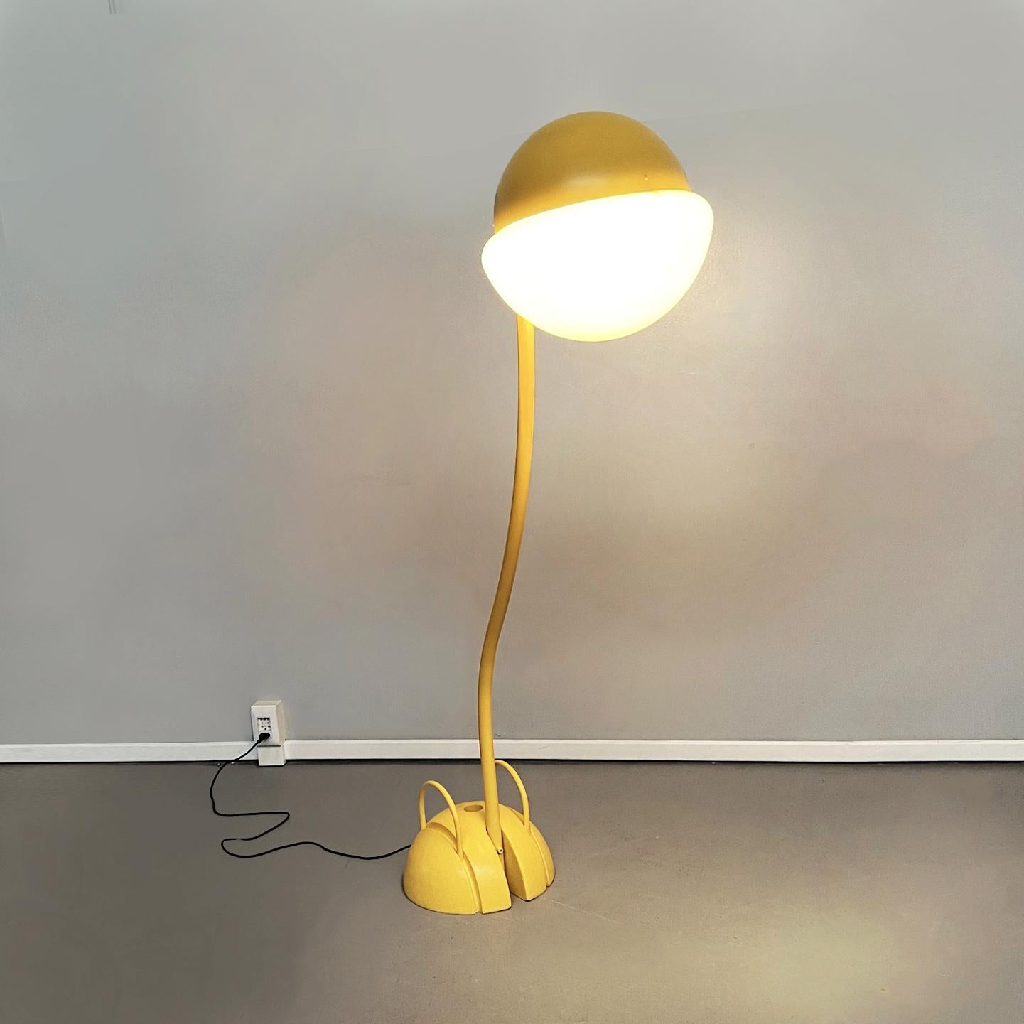 Italian mid-century Yellow floor lamp Locus Solus by Gae Aulenti for Poltronova, 1960s
Floor lamp from the Locus Solus series. The spherical lampshade is half in metal and half in opal polyurethane. The lamp is adjustable thanks to the screw,