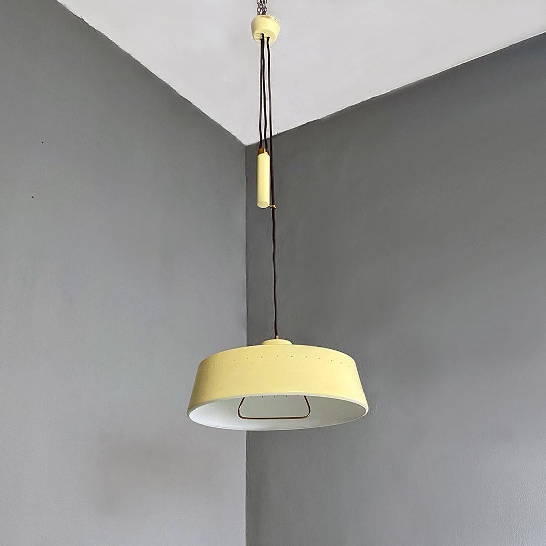 Mid-Century Modern Italian mid century yellow metal, brass chandelier with up and down method 1960s For Sale