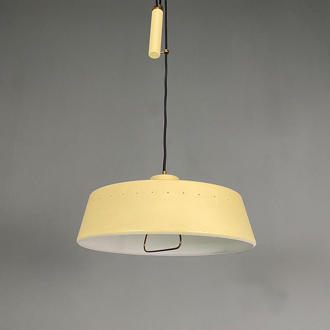 Italian mid century yellow metal, brass chandelier with up and down method 1960s In Good Condition For Sale In MIlano, IT