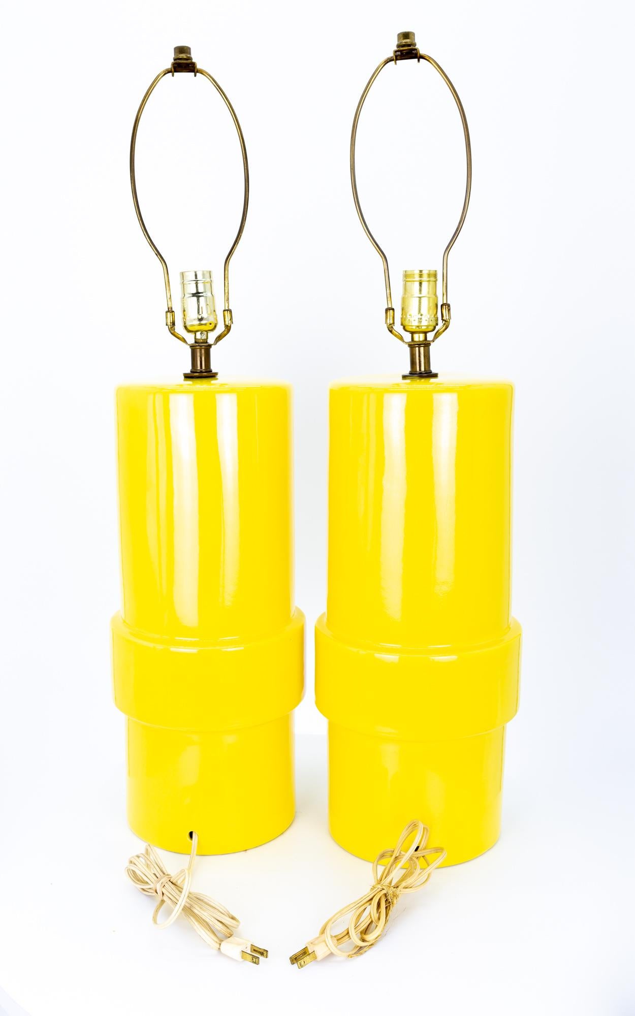 Italian Mid Century Yellow Pottery Table Lamps - A Pair
Each lamp measures 7 wide x 7 deep x 30 inches high and weighs 6.5 pounds

This Lamp is in Excellent Vintage Condition.

Each piece is carefully cleaned and packaged before being shipped