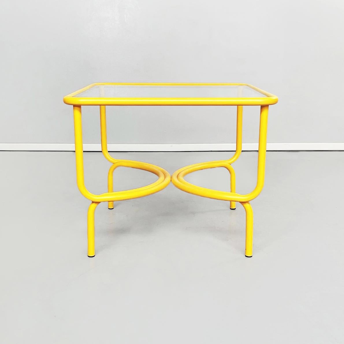 Italian mid-century yellow table Locus Solus by Gae Aulenti for Poltronova, 1960s
Square table from the Locus Solus series, in yellow painted metal. The top is composed by a square tubular profile with rounded corners and a glass top that rests