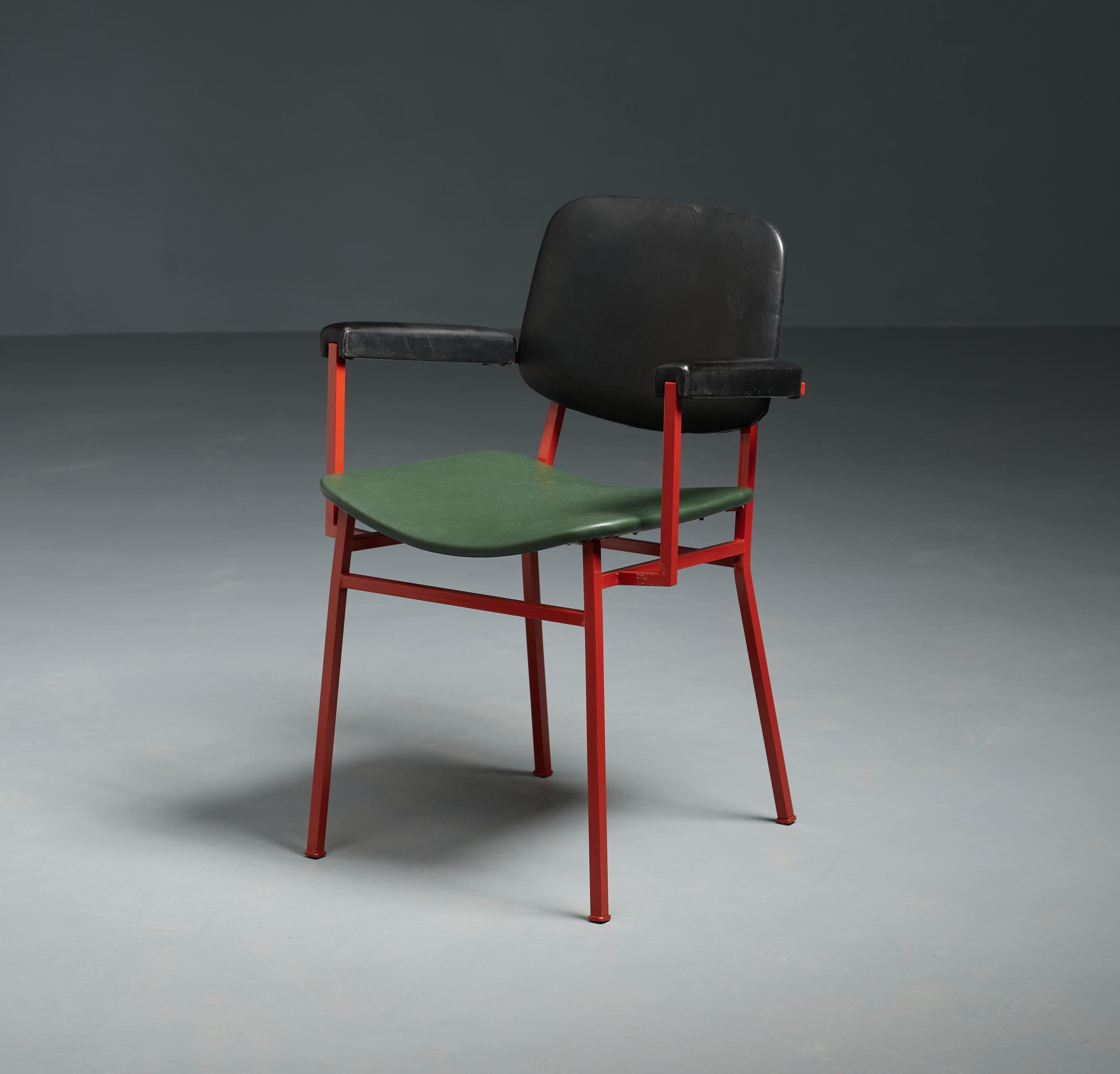Step back in time to the stylish 1950s with this Italian midcentury desk chair. Crafted with meticulous attention to detail, this chair features a sturdy square-sectioned tubular iron frame, beautifully lacquered in vibrant red. The black Skai arms