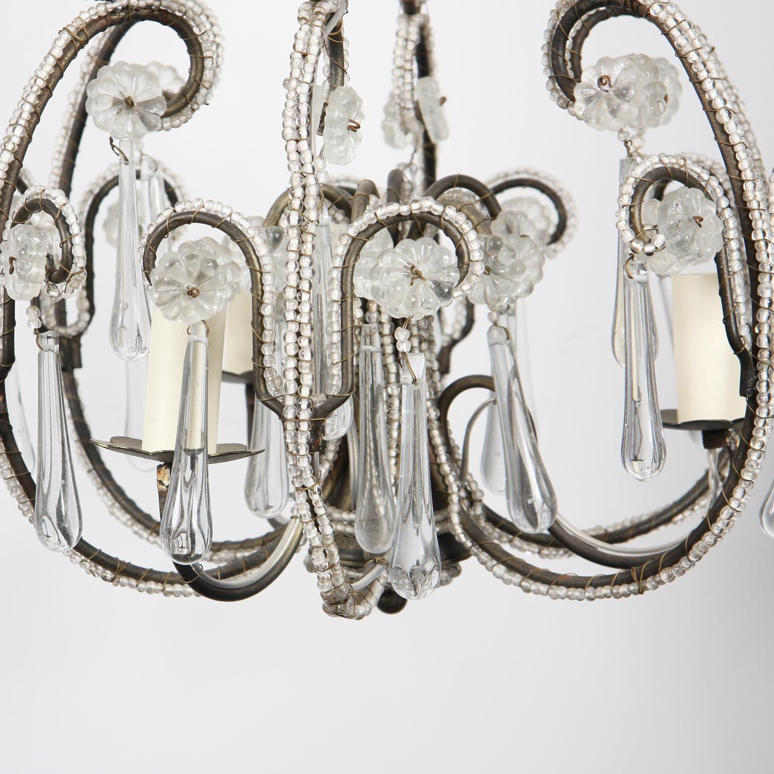 Italian, 1960s

A small, beaded, chandelier with a metal frame.
