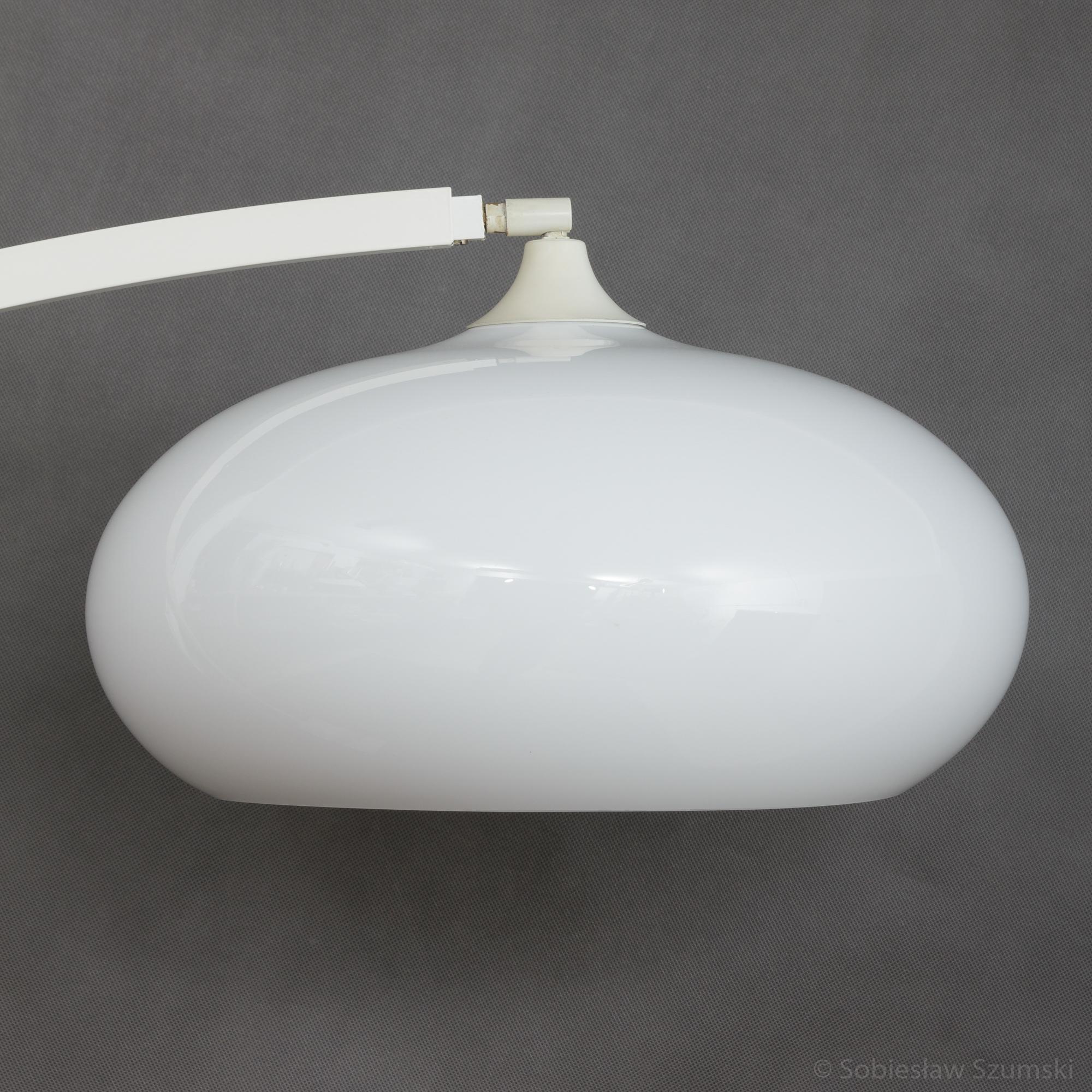 Italian extension arc lamp from the 1970s with marble base slim aluminum rod and acrylic shade. Full length over 2 meters. Original cord with a switch on the floor.