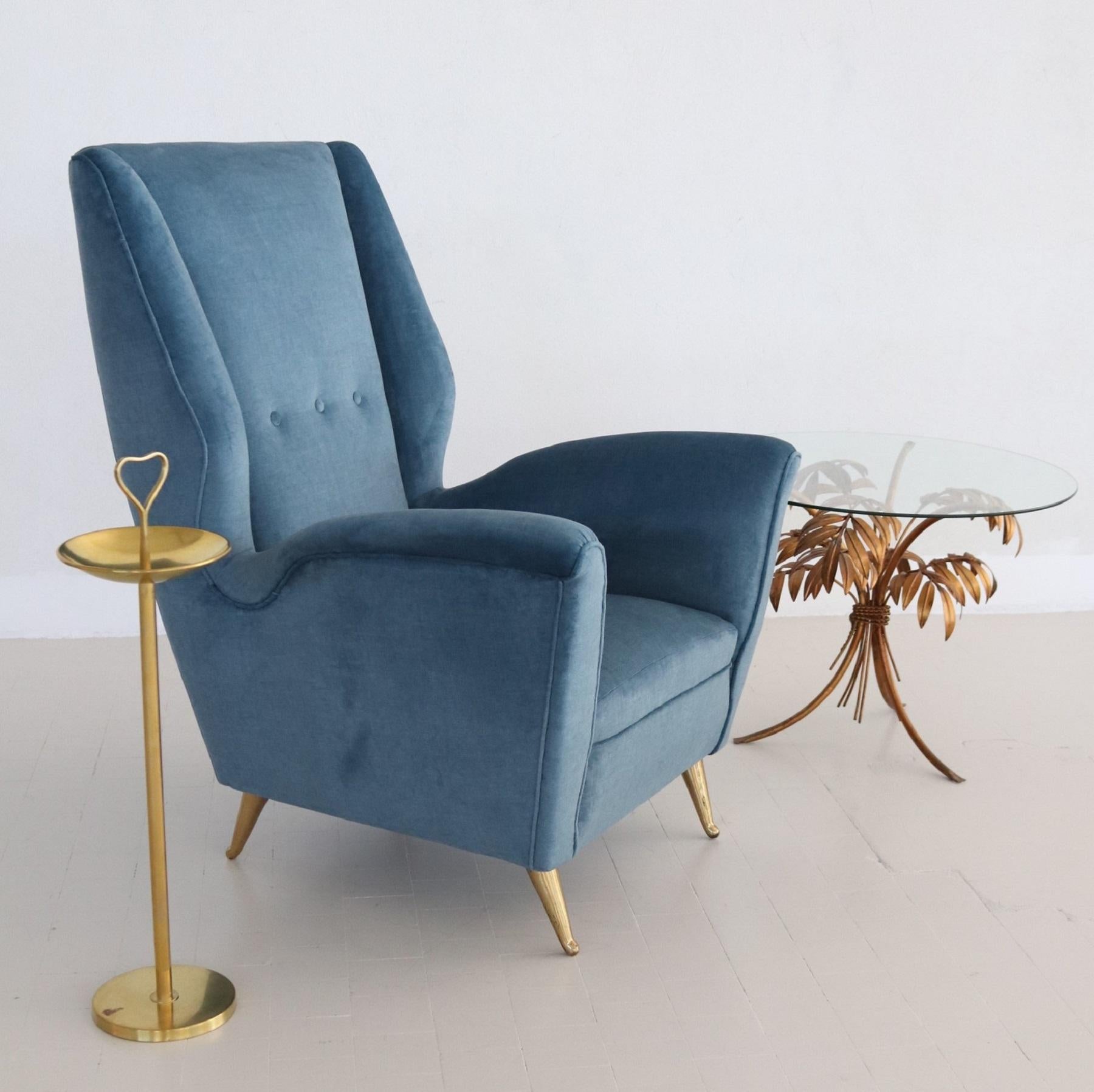 Magnificent, beautiful Italian original midcentury armchair or lounge chair from the 1950s with full brass feet.
Made In Italy by ISA in the 1950s.
Completely restored internally with quality material and outside reupholstered with soft blue