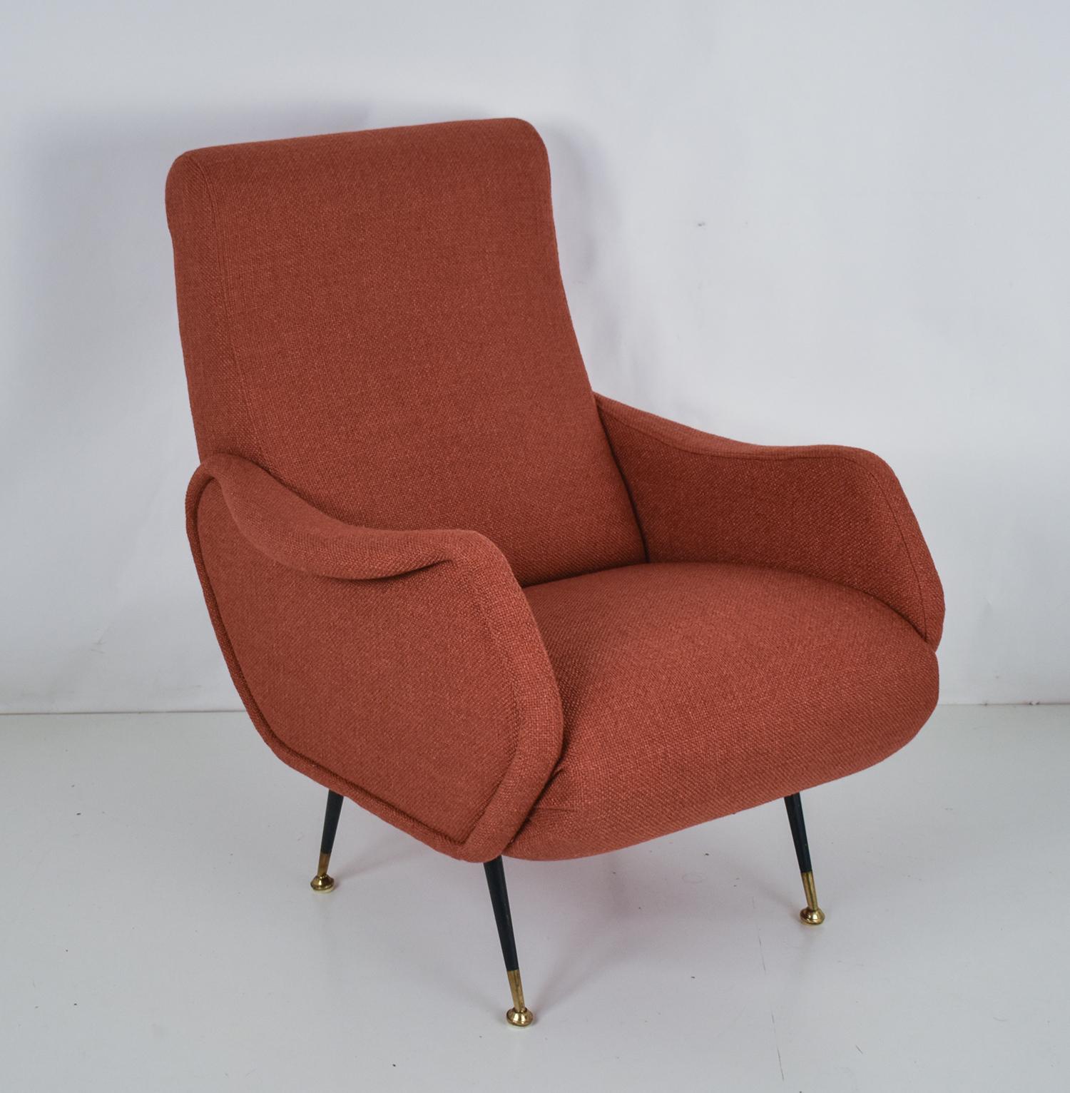 Italian Midcentury Armchair in the Style of Marco Zanuso  , reupholstered 1950's.
Black enamelled legs with brass feet, re-upholstered in a caldera color with Güell Lamadrid fabric.
The armchairs are completely refurbished inside with quality