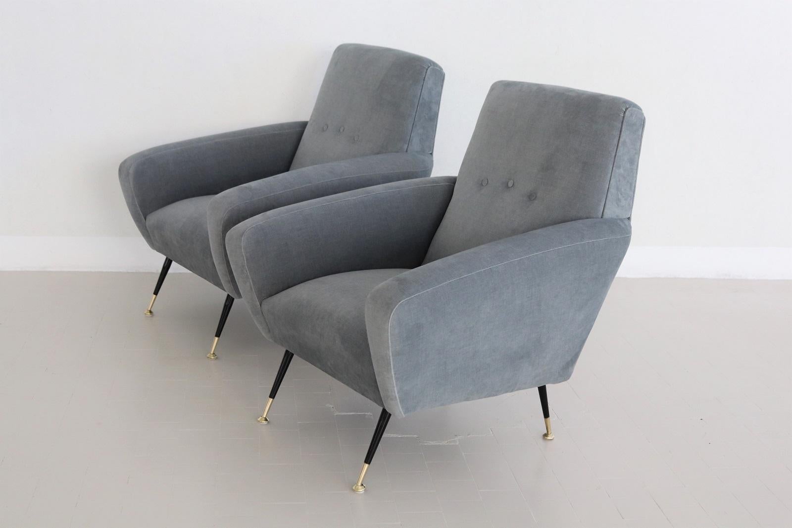Magnificent pair of original Italian armchairs with brass tips from the mid-century, 1950s.
The armchairs are equipped with springs inside for a soft and springy comfortable sitting of great quality.
Completely refurbished with quality material and