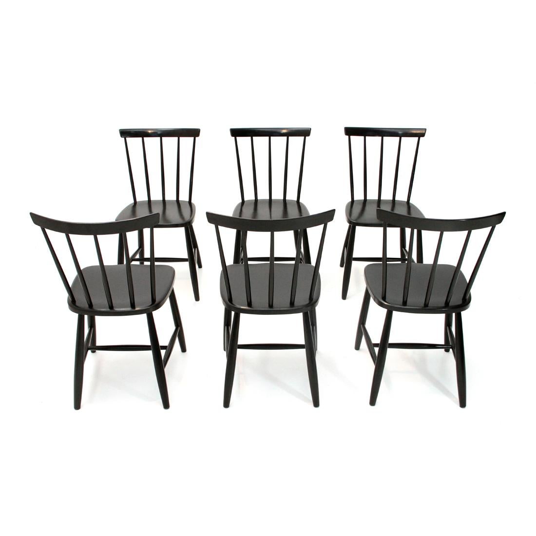 Lot of six Swedish manufacturing chairs produced in the 1960s and imported from Casa Arredo in Milan.
Solid wood frame, black stained.
Good general conditions, some signs due to normal use over time, some woodworm holes closed and