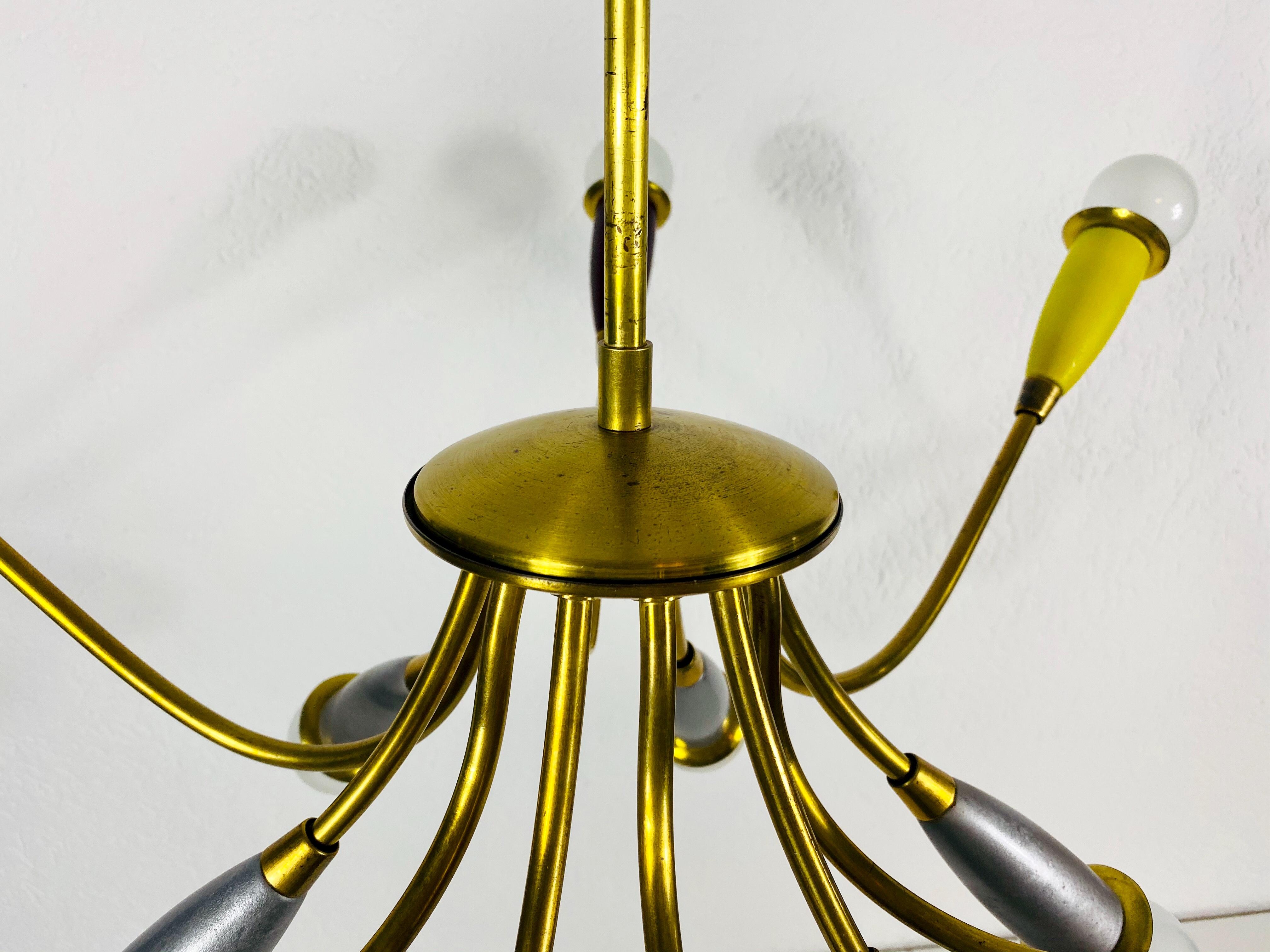 Mid-20th Century Italian Midcentury Brass 12-Arm Sputnik Chandelier Arredoluce Attributed, 1950s