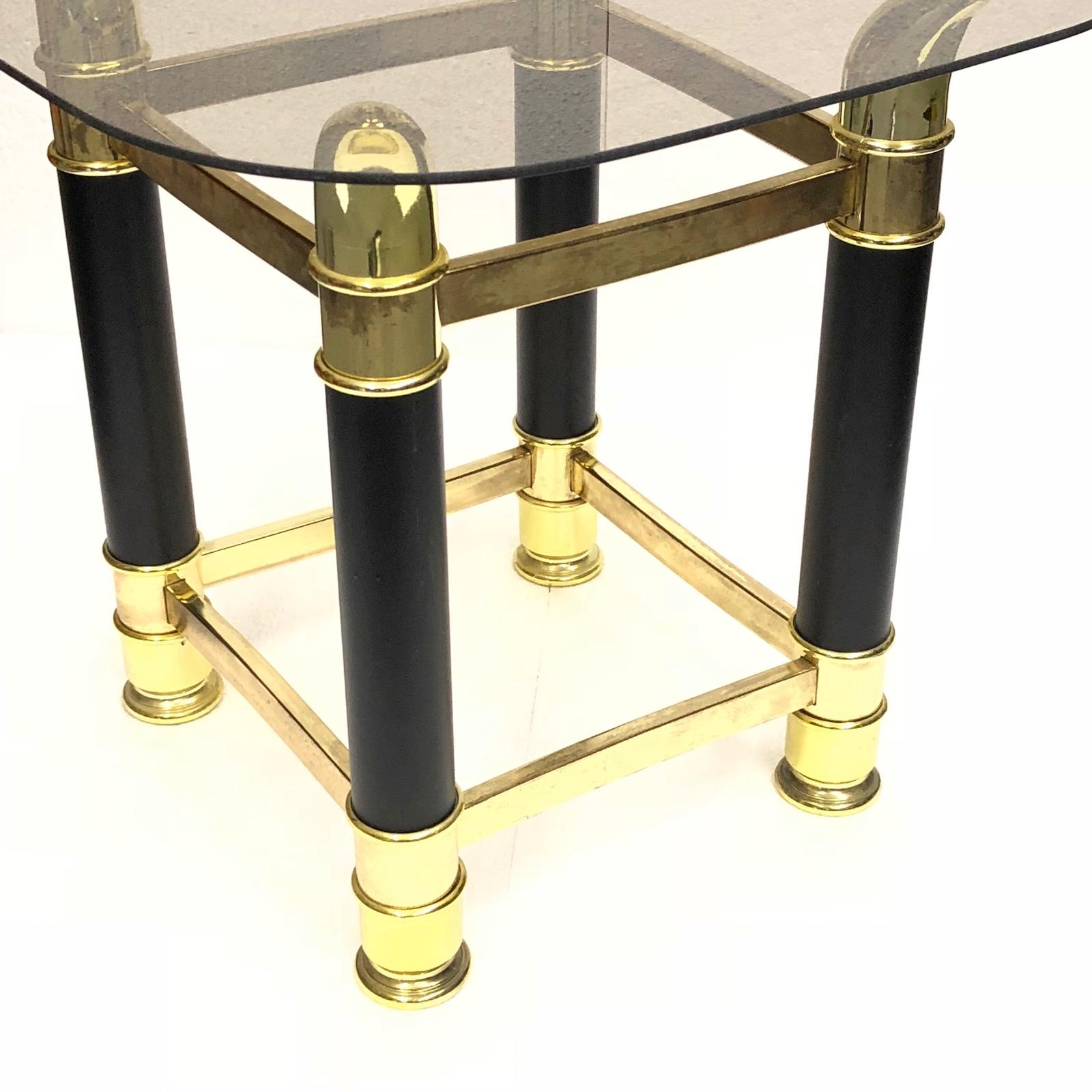 Offered is an absolutely beautiful, 1970s Italian brass and amber glass side table. Minor patina gives this piece a classy statement. a nice addition to any room. 