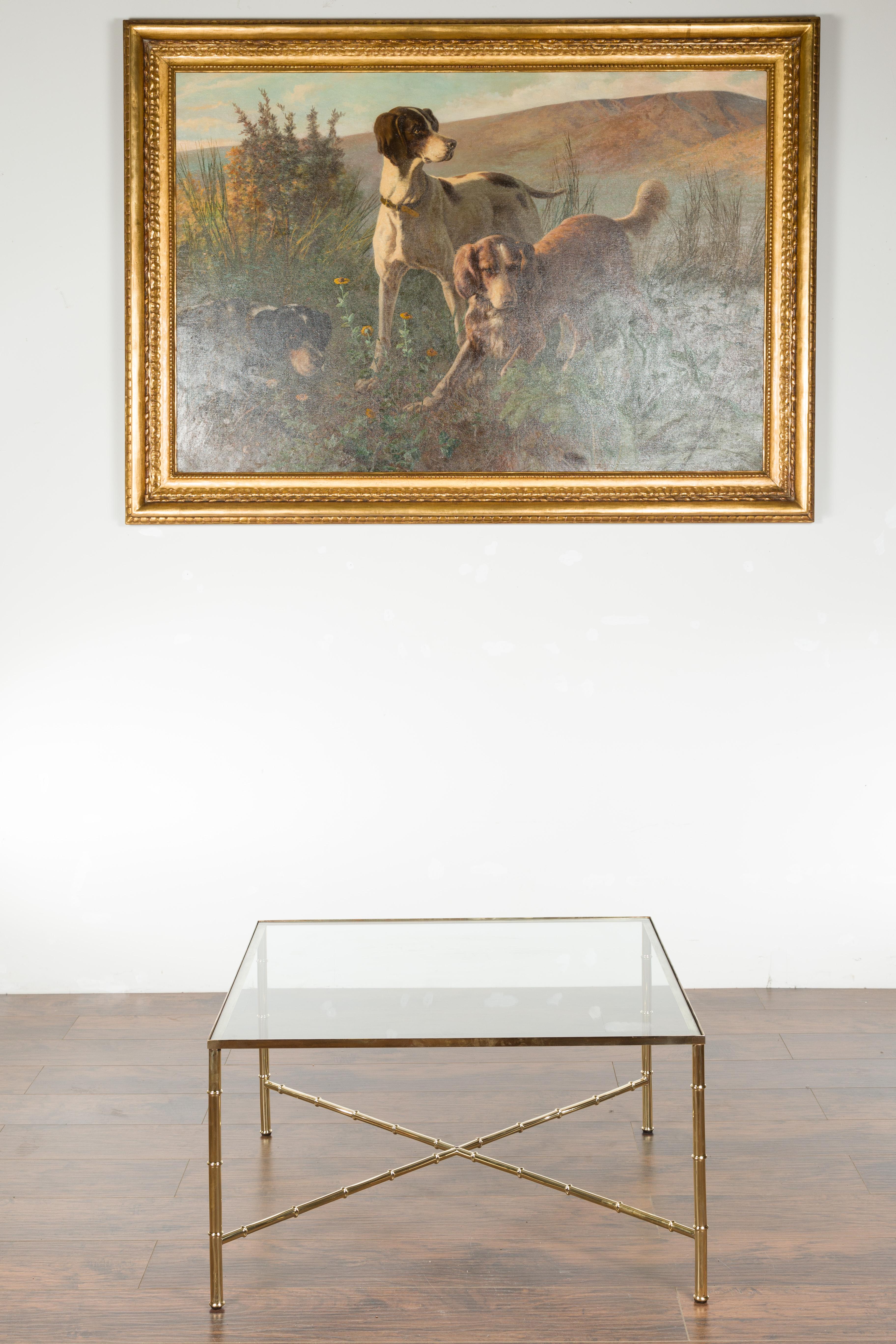 Italian Midcentury Brass Coffee Table with Glass Top and X-Form Cross Stretcher In Good Condition For Sale In Atlanta, GA