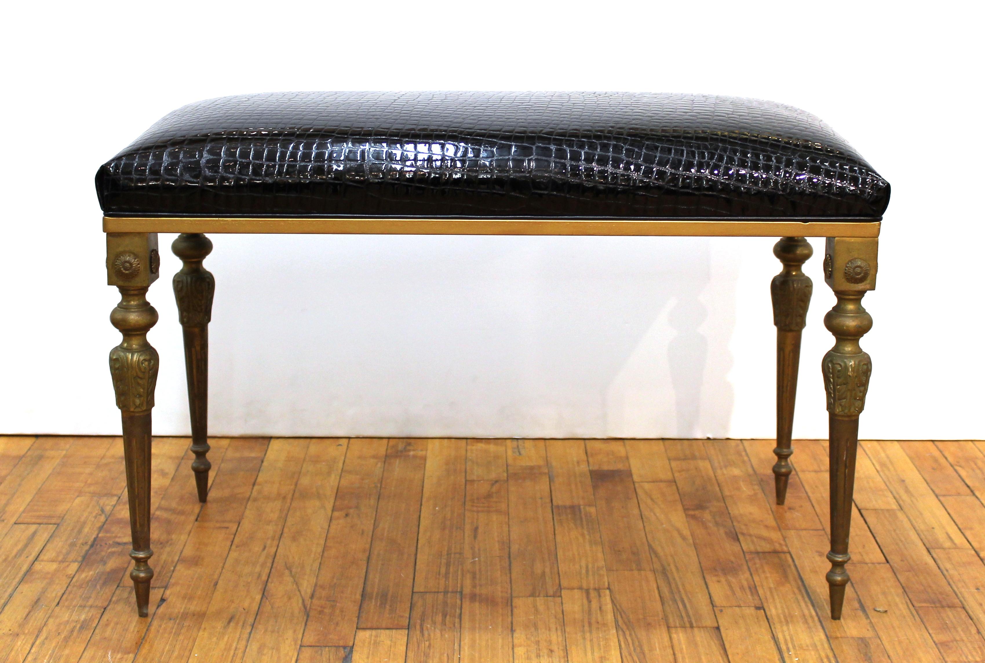 Italian midcentury bronze bench with faux alligator black patent leather seat upholstery. Each leg has 4 decorative rosettes on the top. Made in Italy in the 1950s.
In great vintage condition with age-appropriate wear and use.