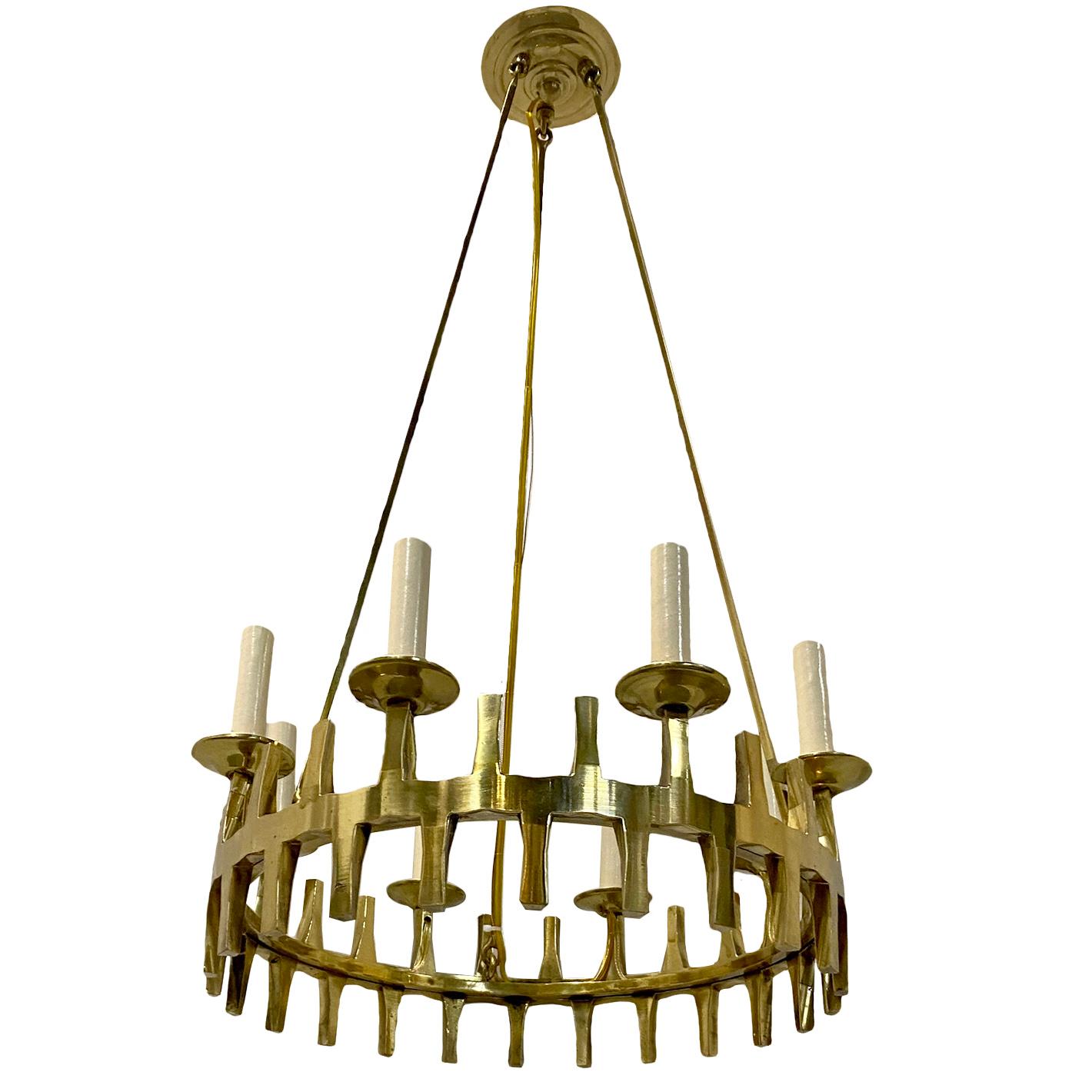 A circa 1950's Italian bronze chandelier with 8 lights.

Measurements:
Drop: 33