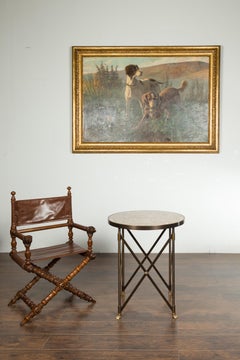 Tavolino italiano del Medioevo in bronzo con piano in marmo variegato e piedini a zampa