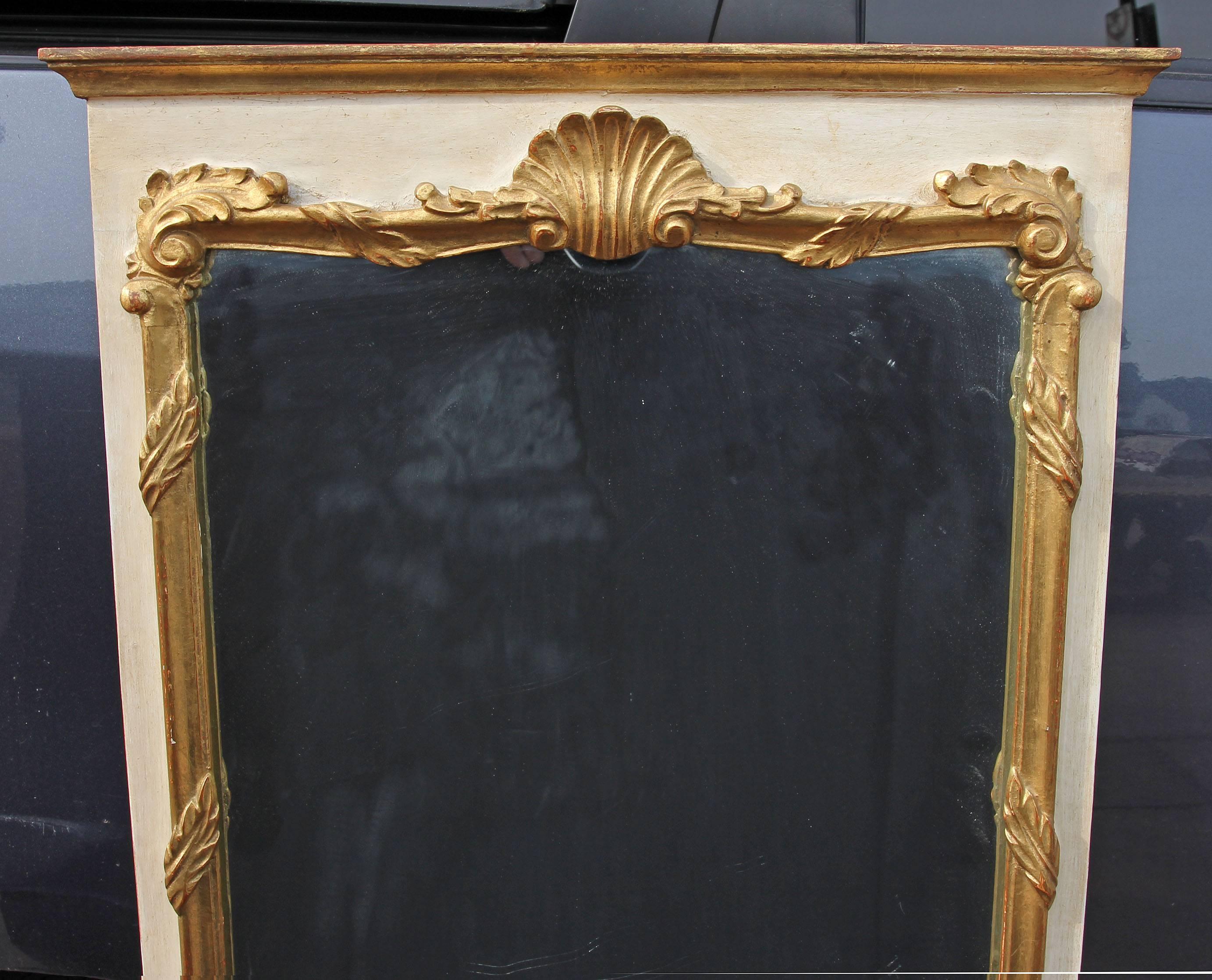 Italian midcentury carved, painted, and gilt mirror. Hard to find narrow size 46.5