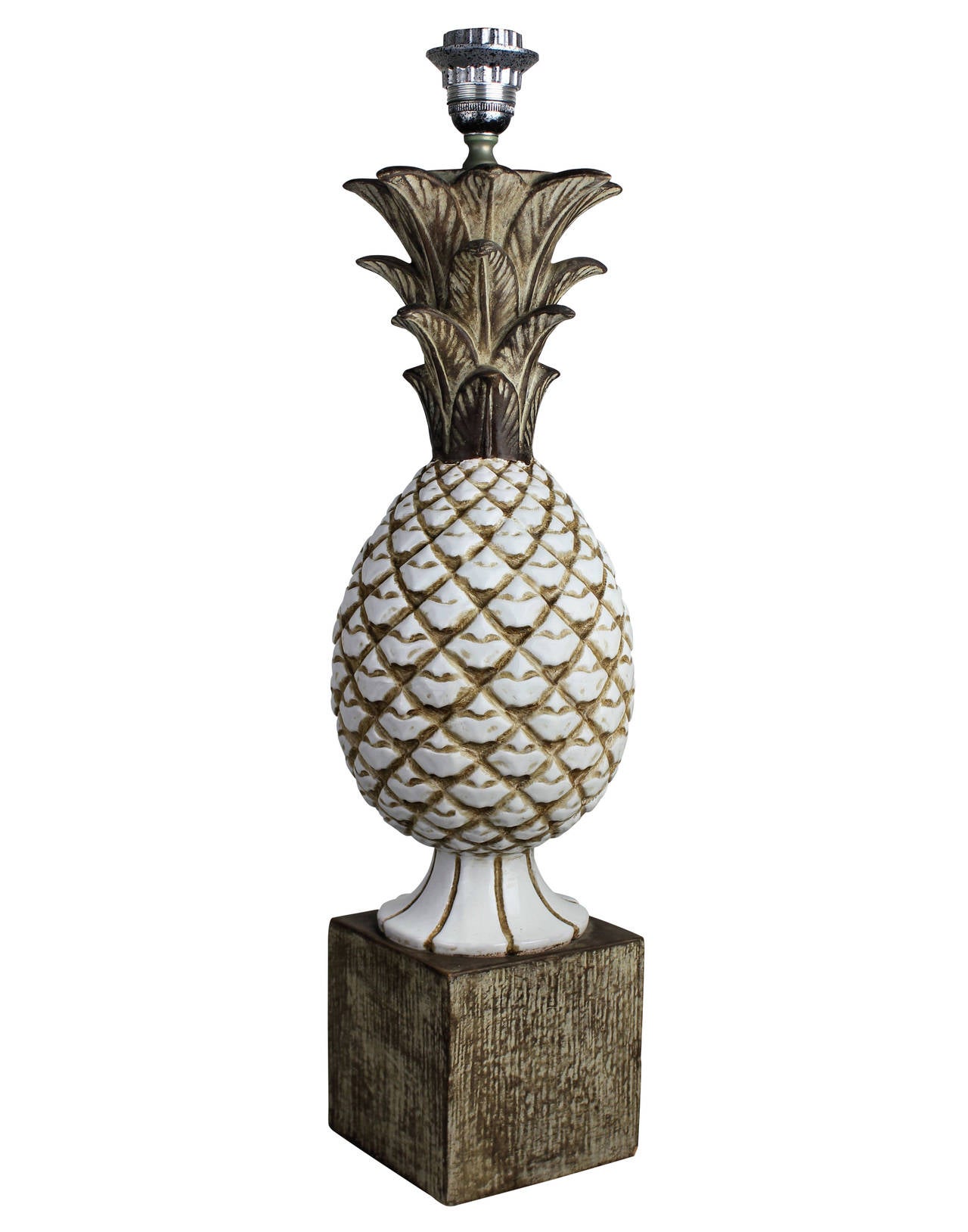 An Italian ceramic lamp depicting a pineapple on a base.