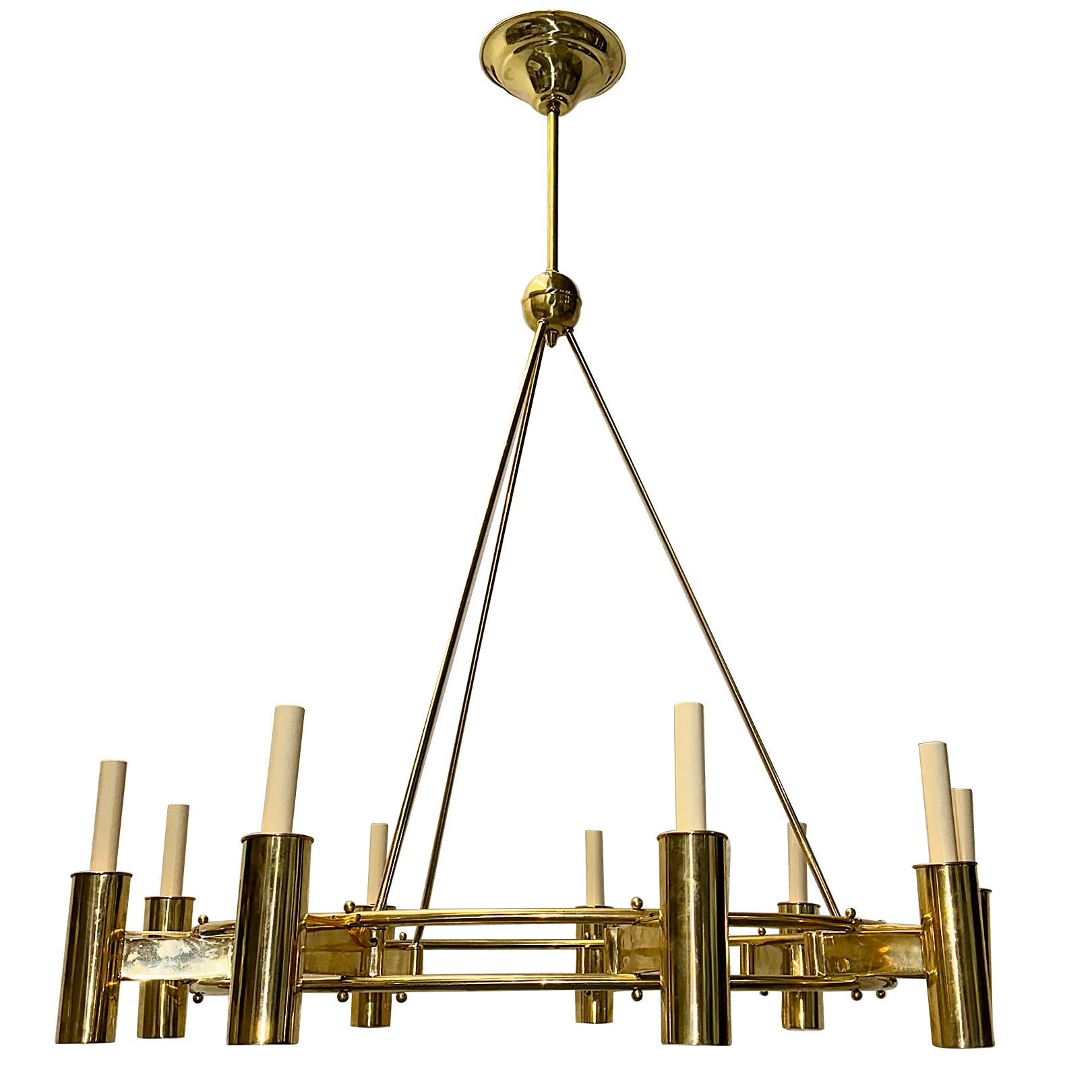 A circa 1950's Italian bronze chandelier with 9 lights.

Measurements:
Present drop: 45.75