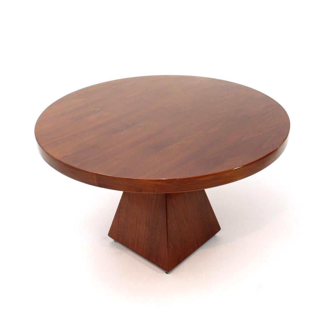 Dining table designed by Vittorio Introini and produced by Saporiti in the 1970s.
Circular wood veneer top.
Pyramid-shaped base in veneered wood.
Good general conditions, some signs due to normal use over time.

Dimensions: Diameter 120 cm,
