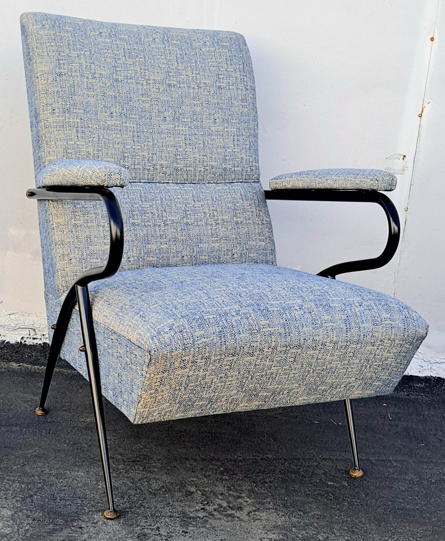Italian metal frame armchair has a modern and slick design as well as the durability. The metal tubular steel as a base with the bras bouts. Italian upholstery is combine linen and cotton material.