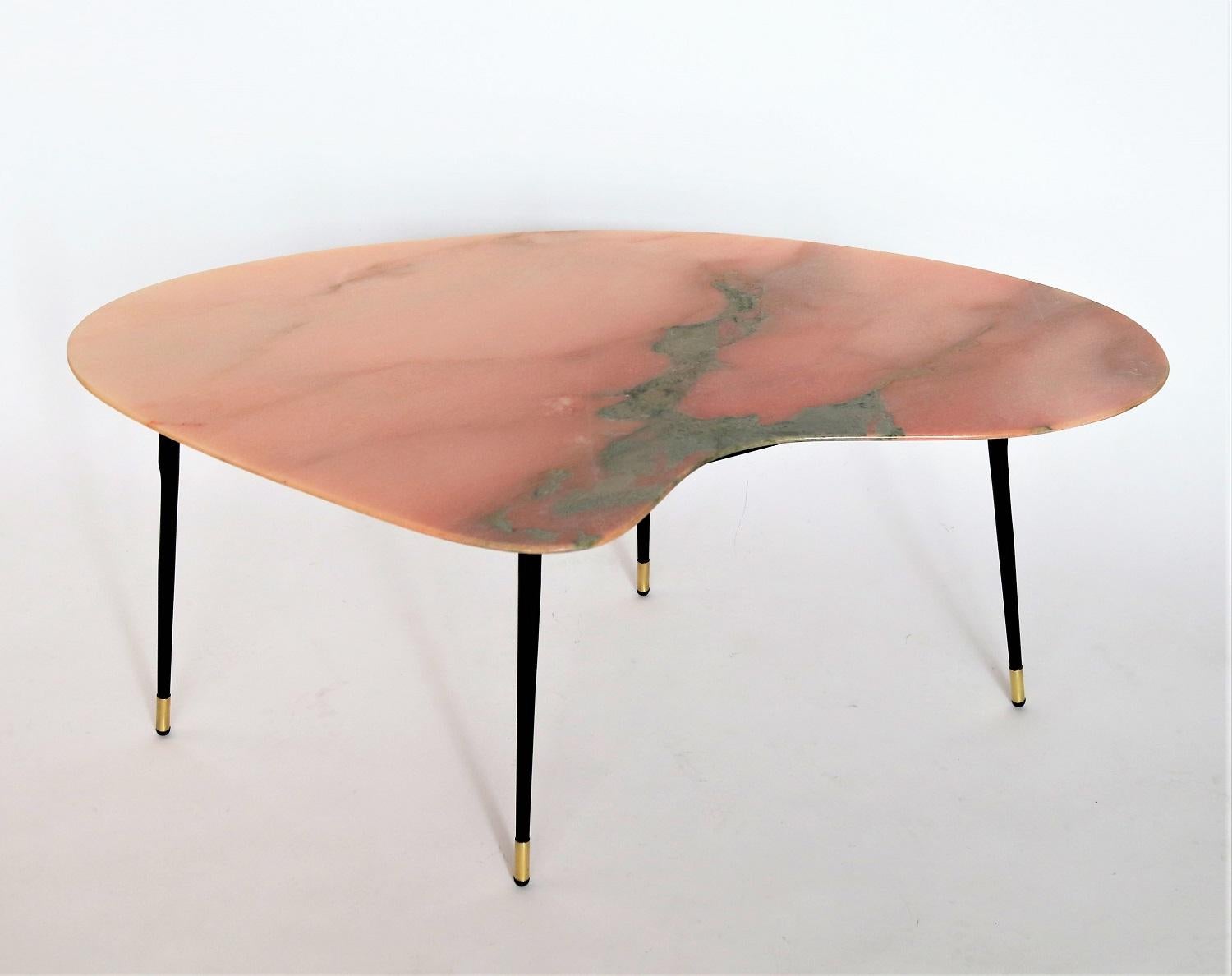 Beautiful coffee table with gorgeous elegant pink and green marble top and metallic legs with brass tips.
Made in Italy during the 1950s.
The marble is called 