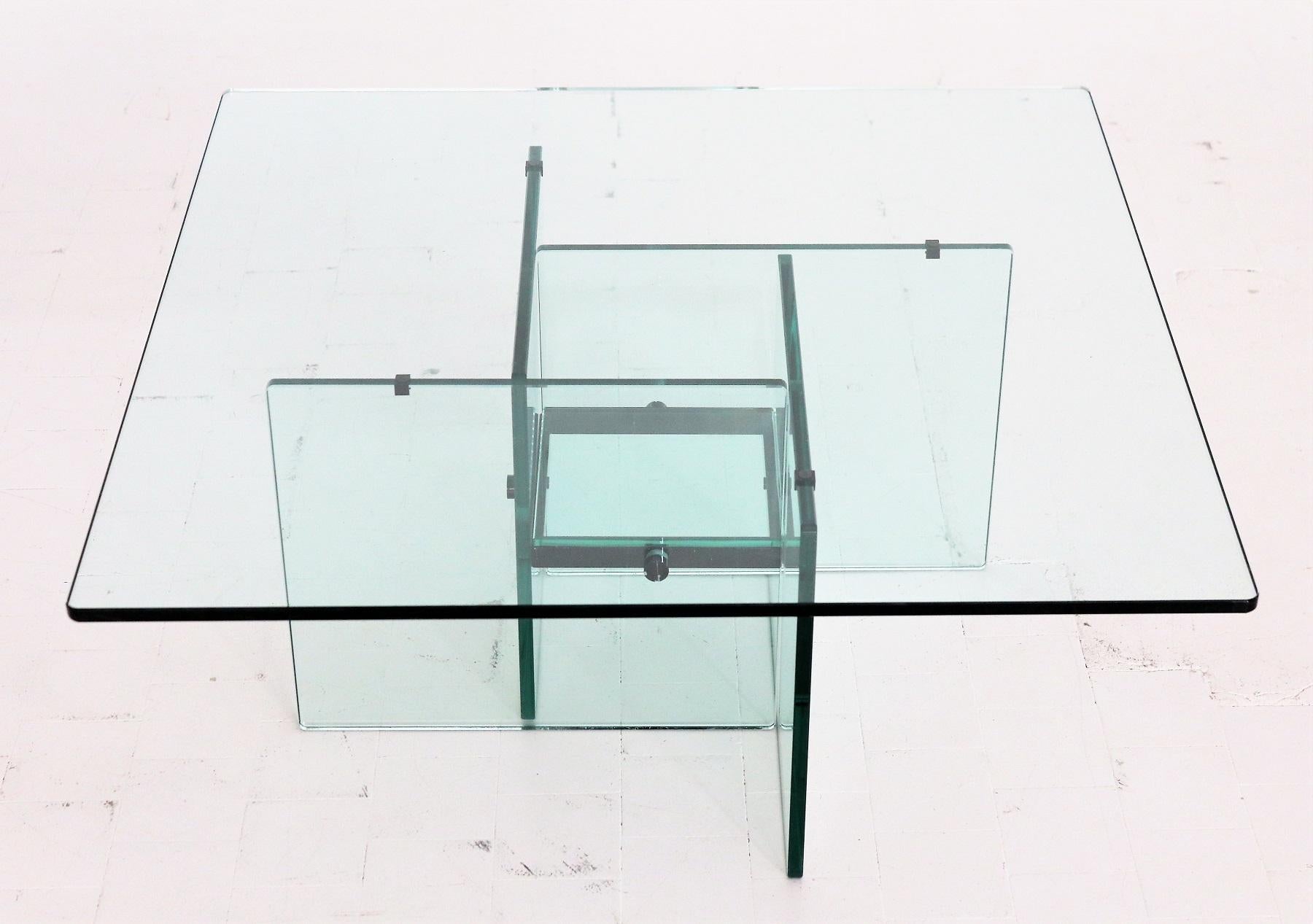 Beautiful crystal glass coffee table made in the 1970s in Italy.
It reminds very much to tables from Fontana Arte.
The table consists of one big glass top, which lays on the table base with small custom devices in order not to lay directly on the