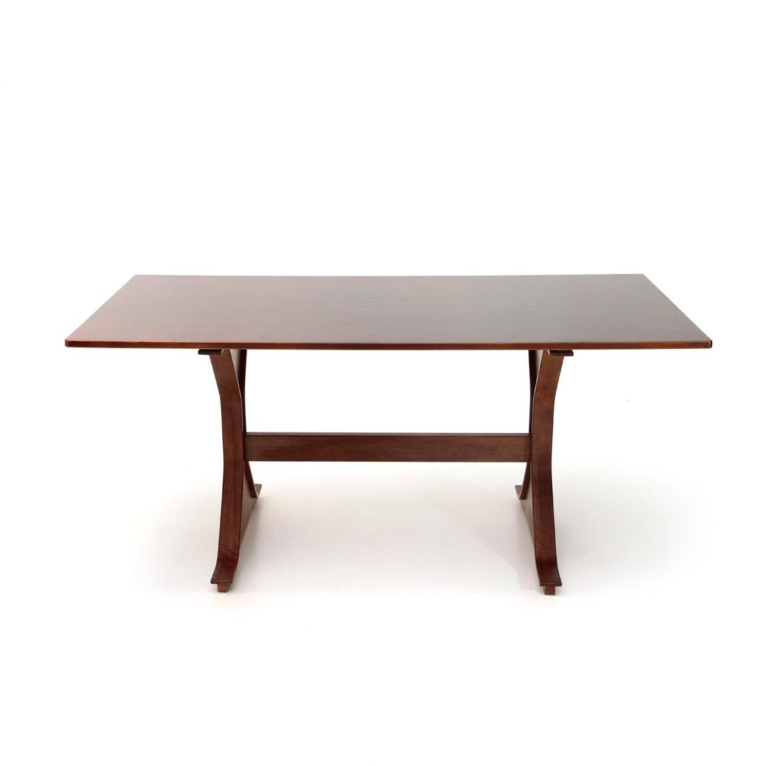 Table produced by Bernini based on a project by Gianfranco Frattini in the 1960s.
Rectangular top in veneered wood.
Playwood veneered structure.
Good general conditions, some signs and lack of veneer due to normal use over