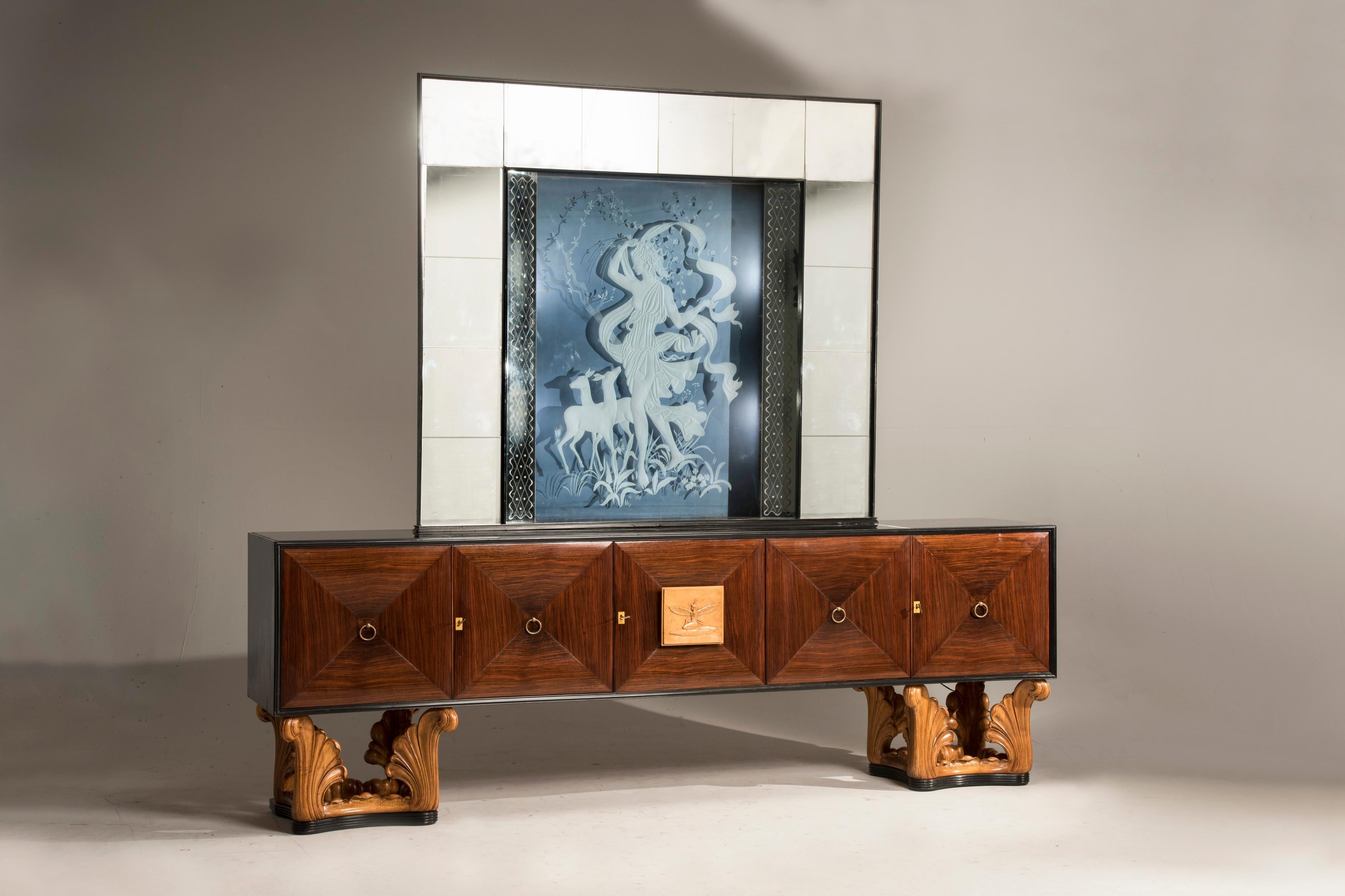 Italian midcentury eclectic mirrored credenza and light blue illuminated mirror

Italian midcentury five doors credenza, production by Cava Mobili from Bergamo. The credenza features a big illuminated mirror with a light blue background. On the