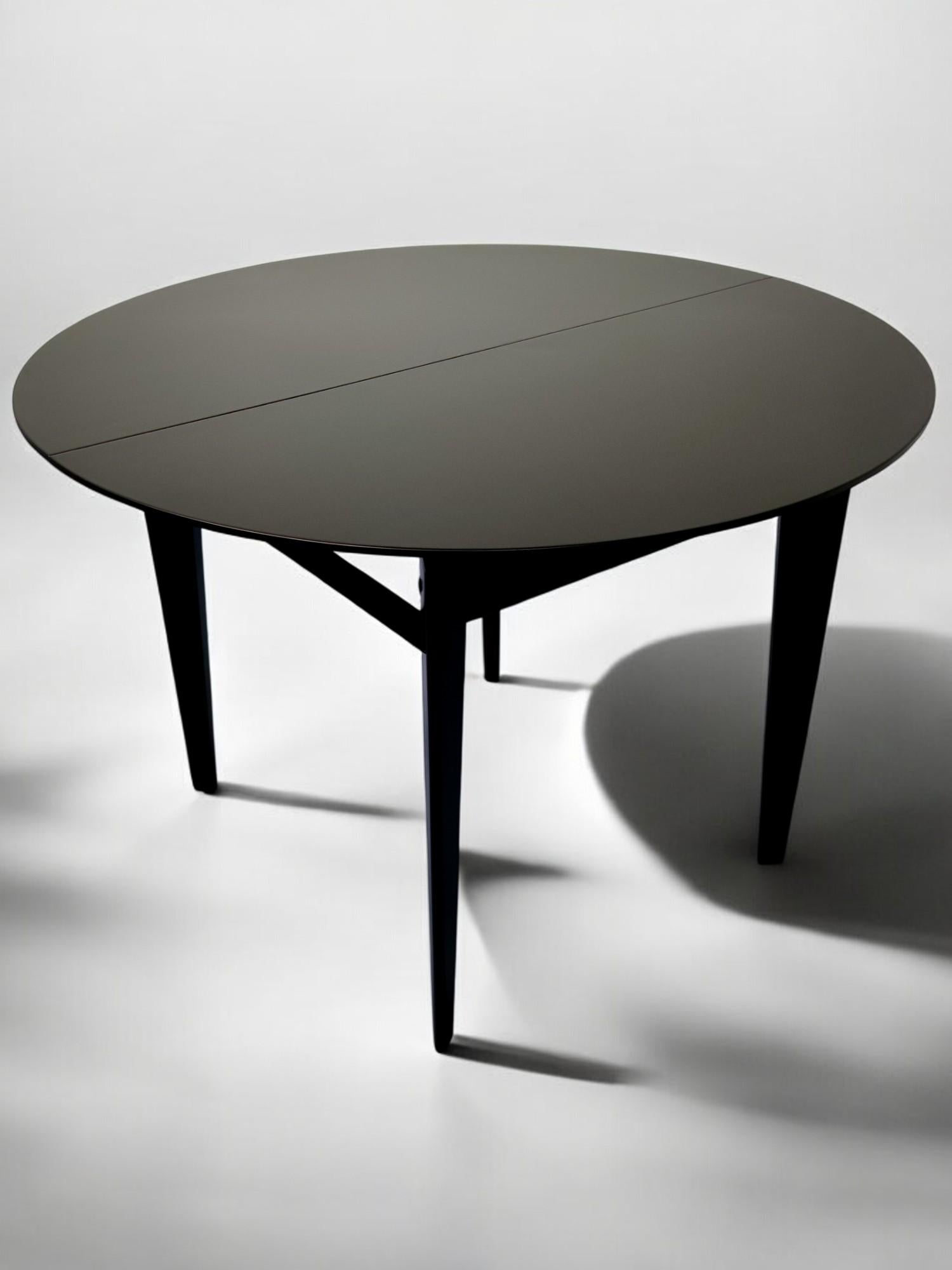 round extendable dining table black