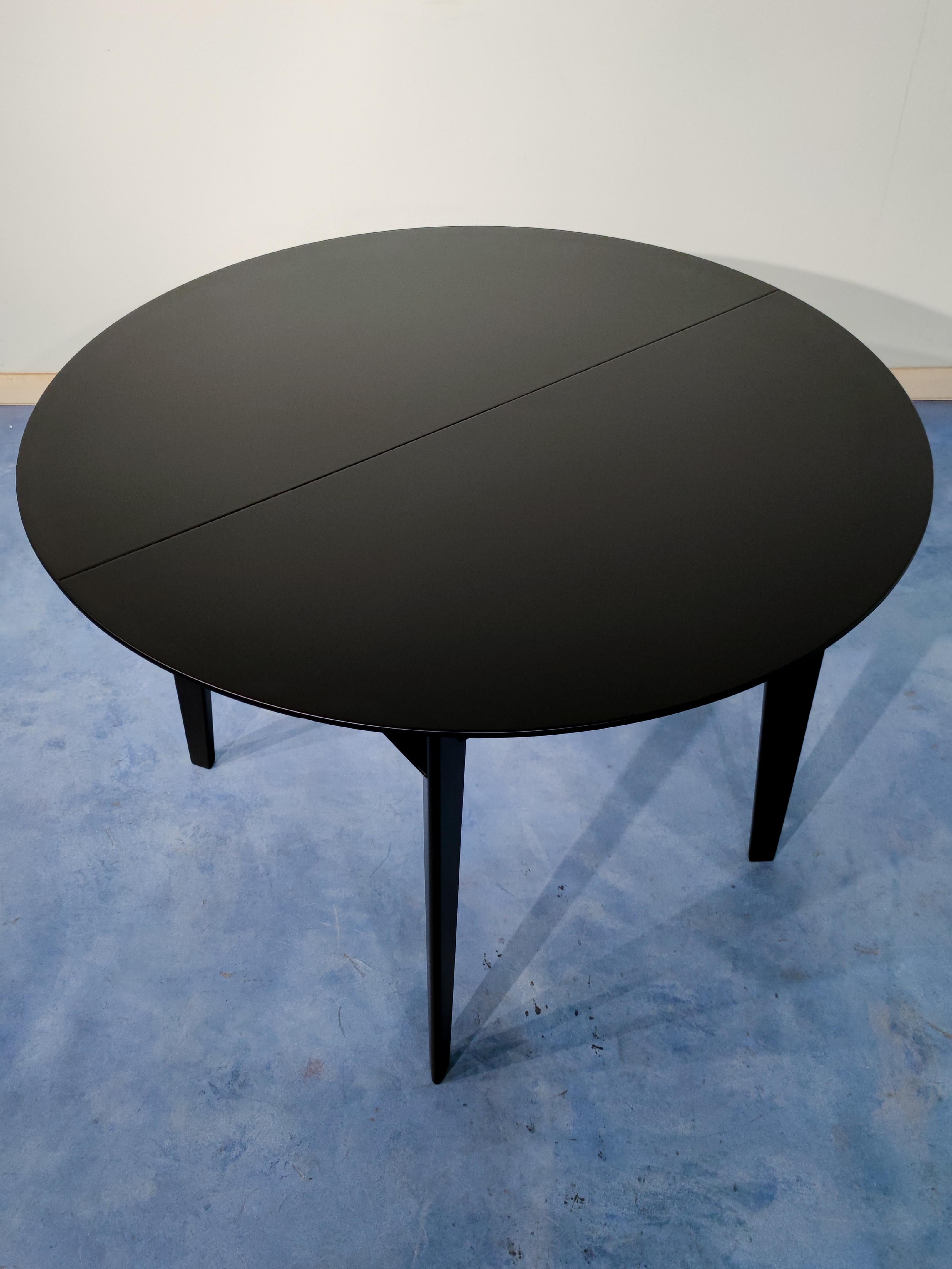 round extendable dining table black