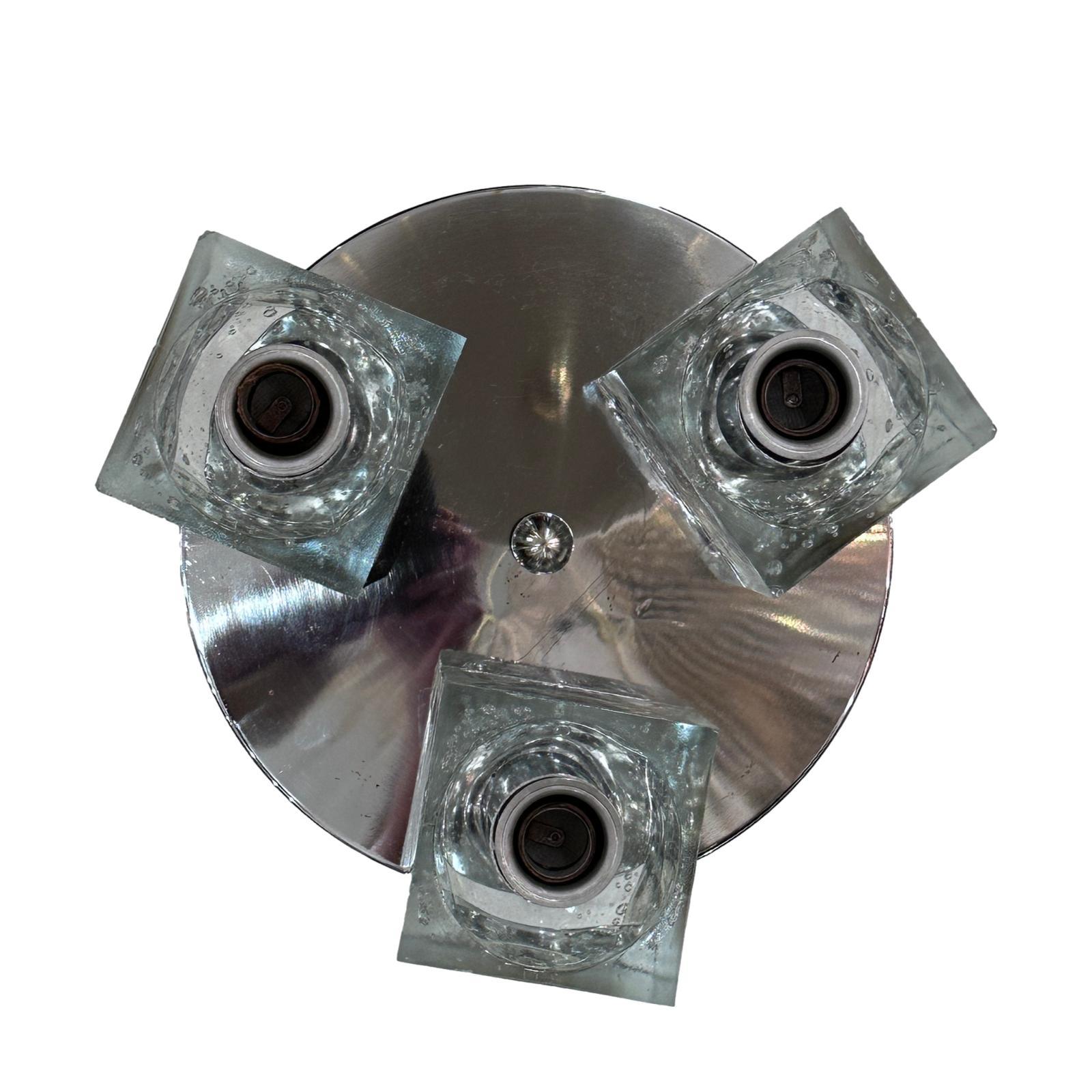 A circa 1970's Italian three-light flush mount with glass insets.

Measurements:
Drop: 5.5