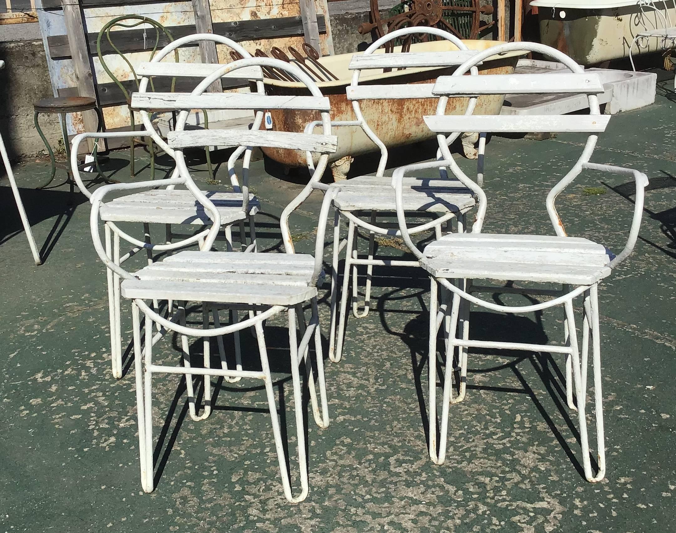Italian midcentury garden chairs in white lacquered iron and wood from 1960s.