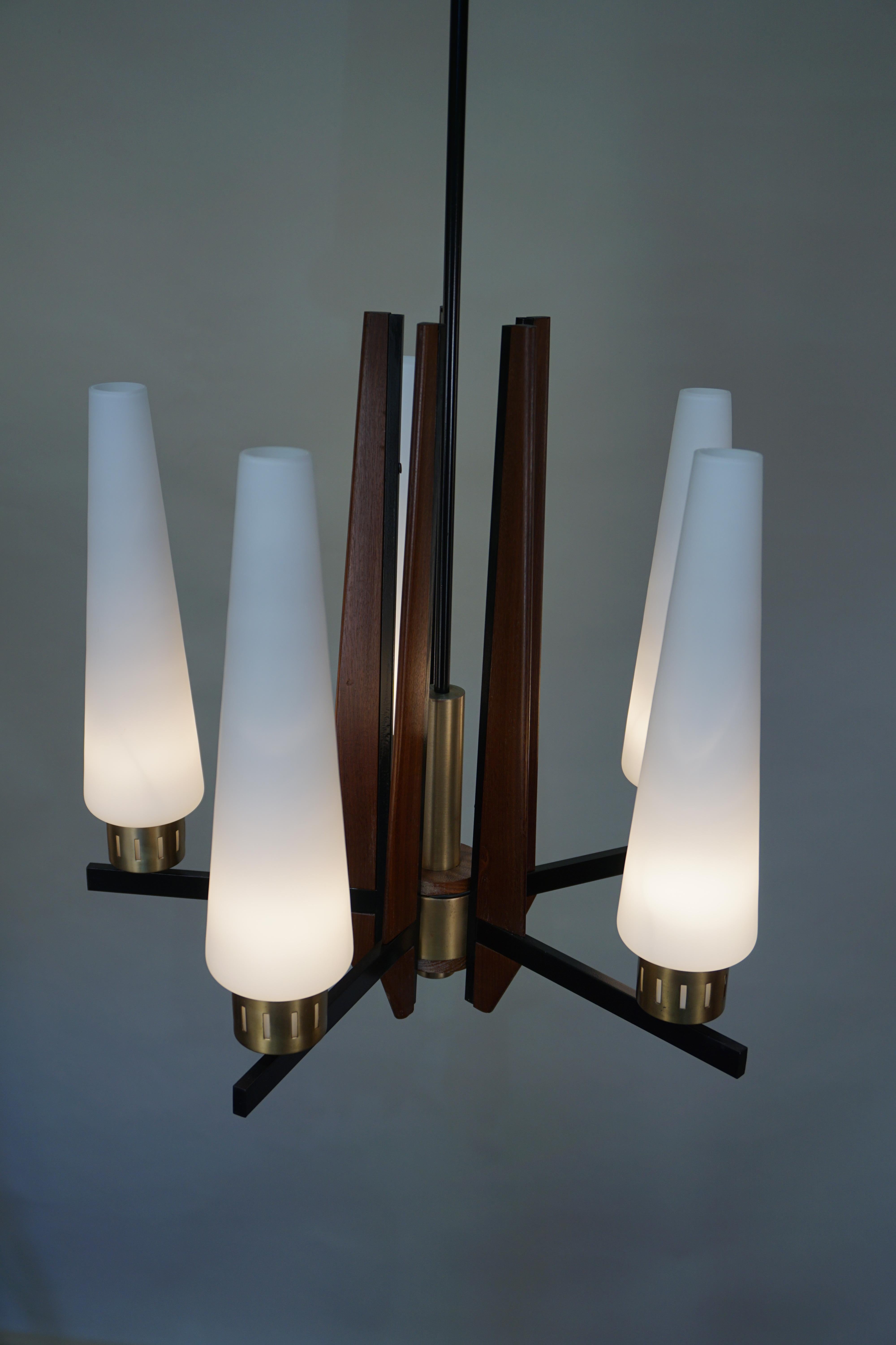 Italian midcentury wood, bronze and black lacquered metal chandelier with glass shades.