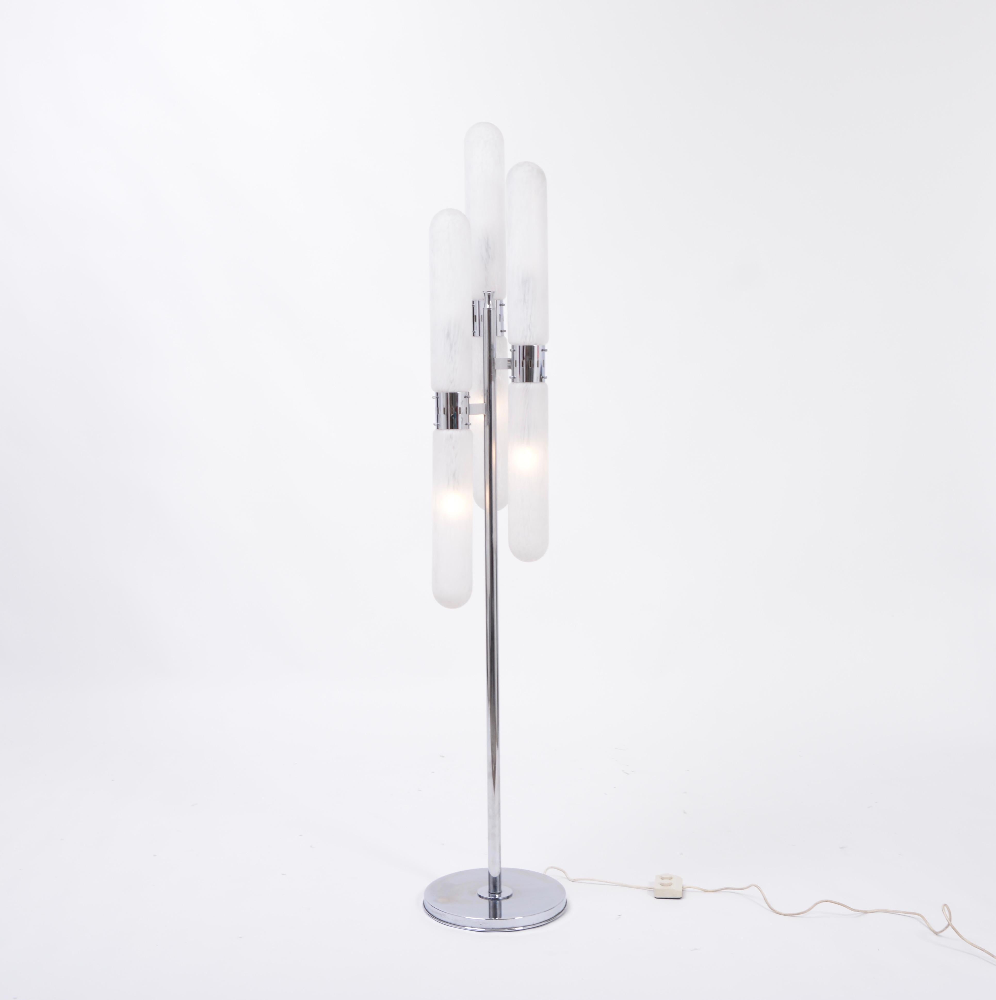 Sculptural vintage Italian floor lamp designed by Aldo Nason and produced by Mazzega during 1960s. The lamp has 6 lights divided into three cylinders separated by a polished steel collar. The lamp has a switch to only illuminate the top three or the