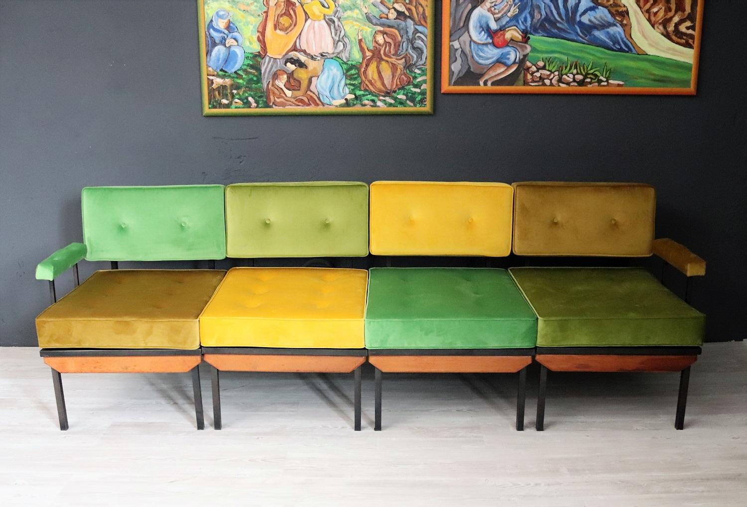 Gorgeous colorful sofa made in Italy in the 1960s.
The sofa is composed of 4 seating elements, which can be used also singularly. The are made of a metal frame with 1 wooden detail in front.
Two elements are equipped with armrests.
The basic