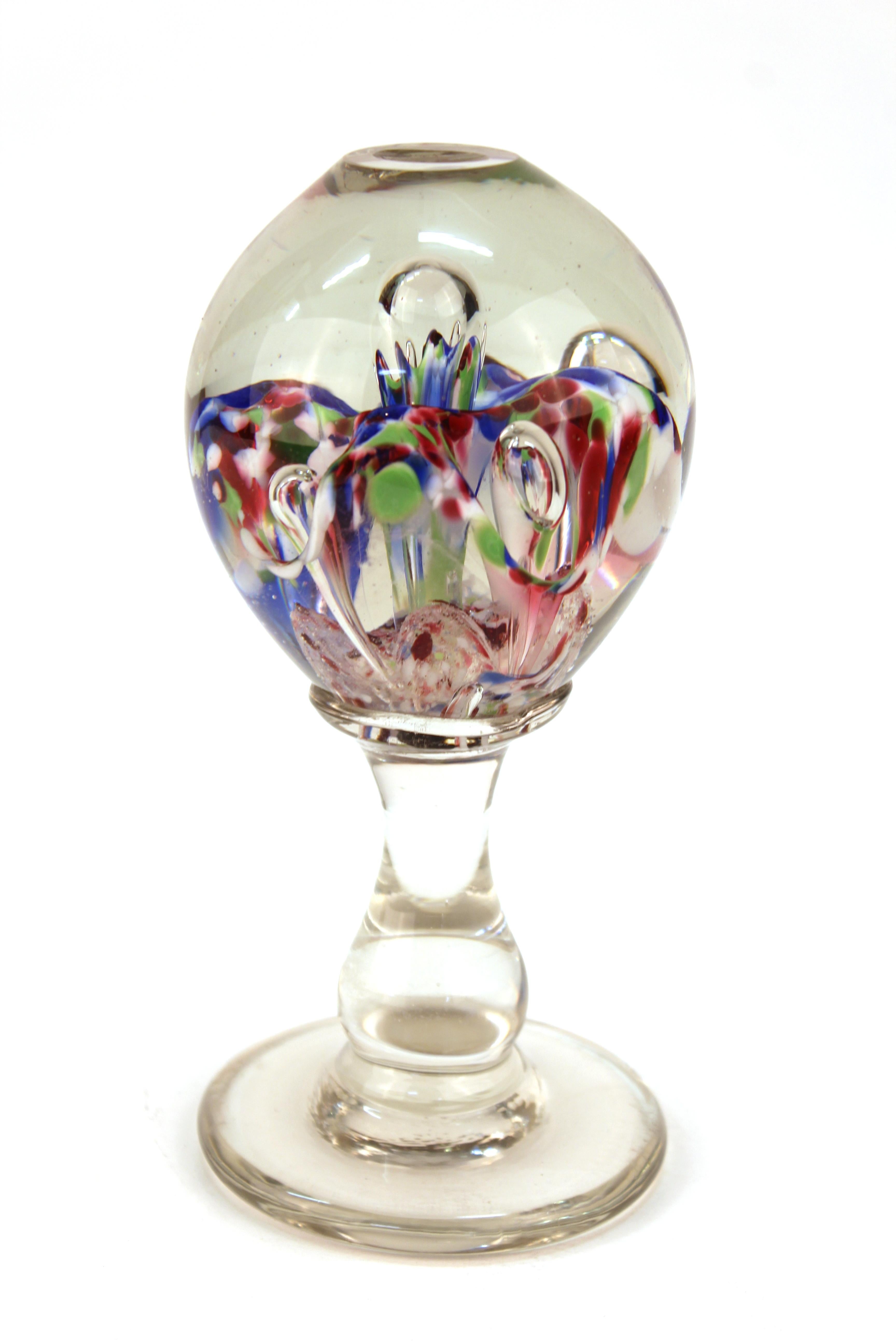 Italian Mid-Century Modern Murano art glass sphere with floral motif atop a glass Stand. The item is in great vintage condition with age-appropriate wear to the bottom.