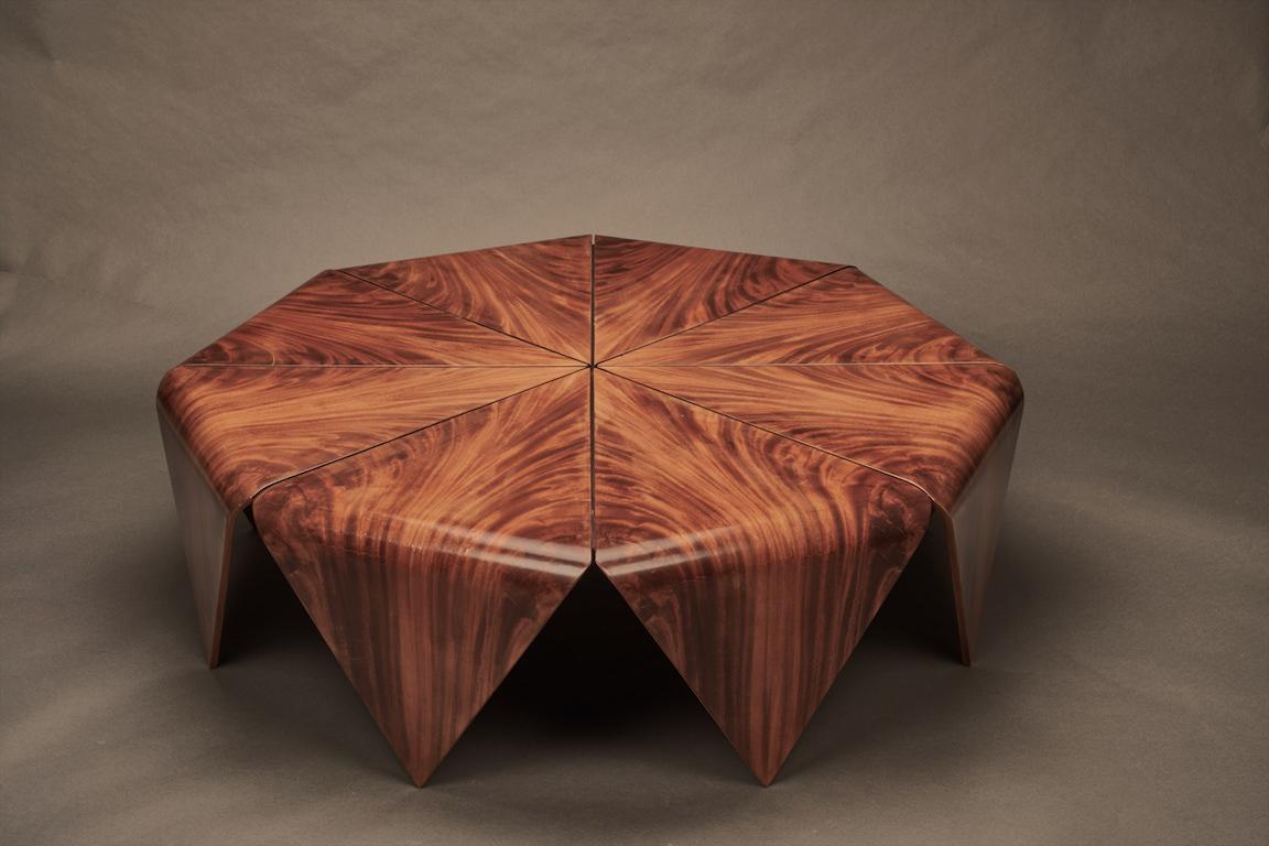 Originally designed in the 1960s the octagonal Petalas coffee table was inspired by the folded paper structures of origami, and originally reutilized the leftover pieces from another of Zalszupin's table • the Andorinha • for its fabrication. With