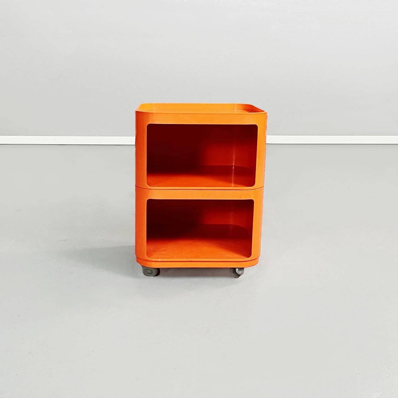 Italian mid-century Orange plastic chest of drawers by Castelli for Kartell, 1970s
Modular chest of drawers with a square base with rounded corners in orange plastic. The chest of drawers has two open compartments. As feet it has black wheels to