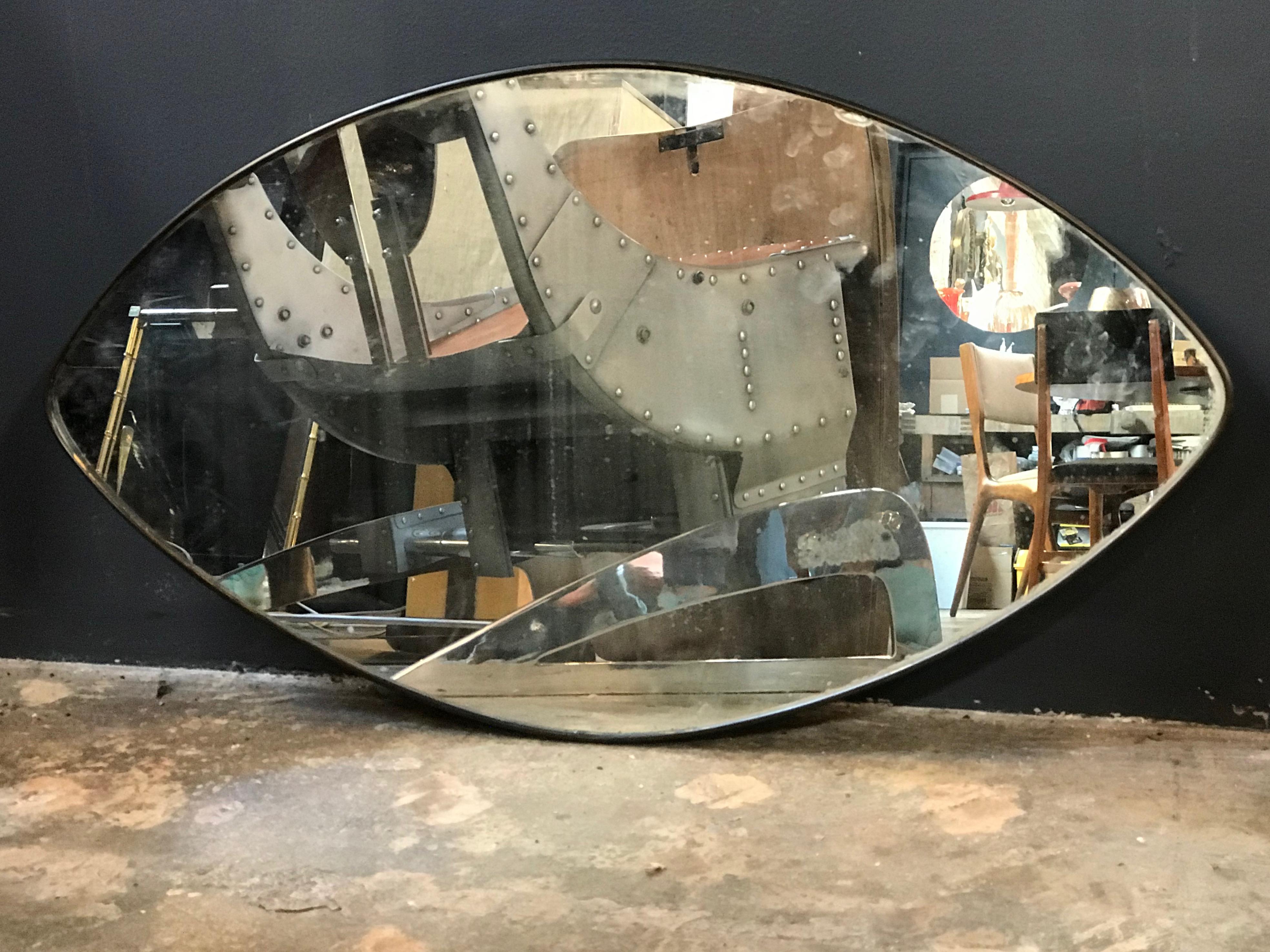 Italian midcentury oval brass wall mirror, 1950s
Sinuous, minimal brass framed oval mirror, Italy circa 1950.
It is equipped with wooden plate and strong hook for wall hanging in both directions ( vertical/horizontal ).