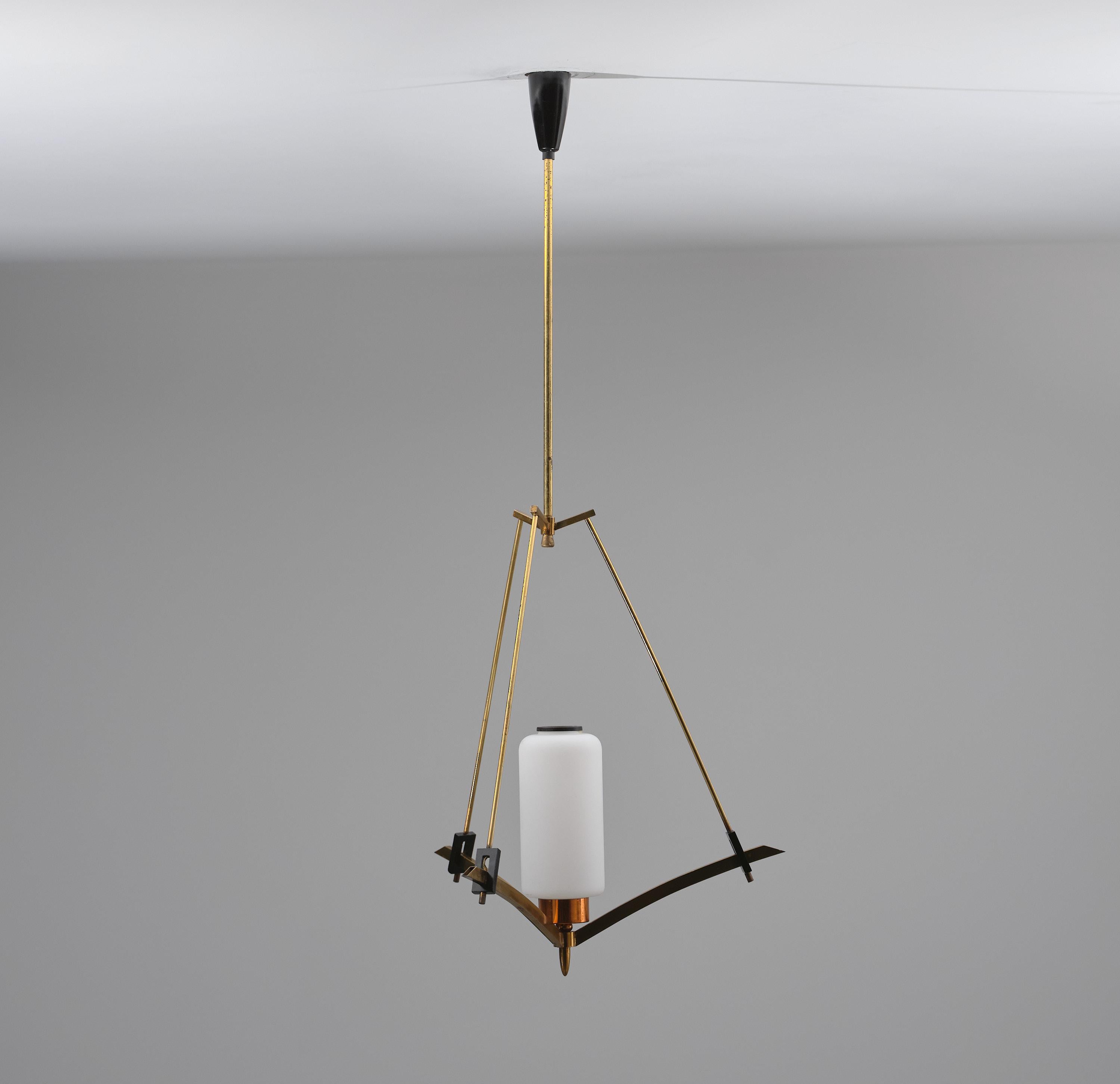 Presenting an exquisite Italian pendant chandelier, meticulously crafted to captivate and illuminate with its opulent features.

This remarkable lighting fixture showcases a stunning fusion of opaline glass, original brass with its timeless patina,