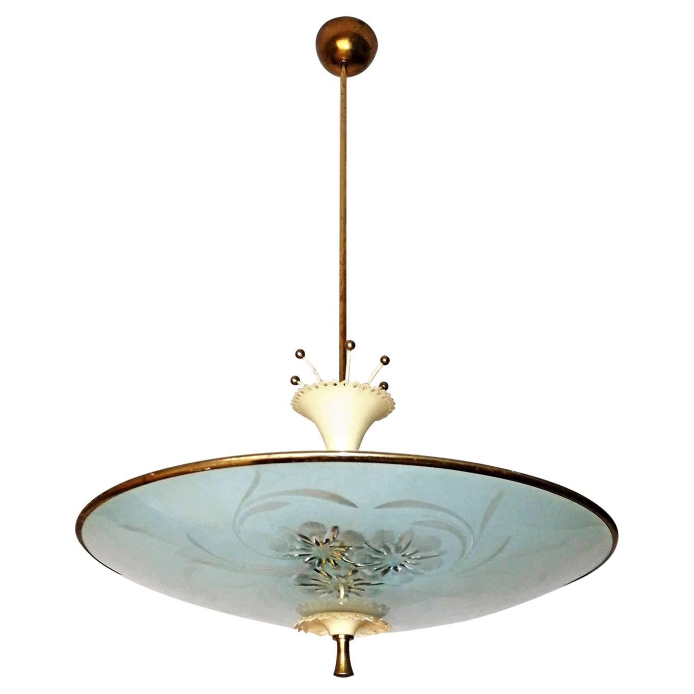 A large Mid-Century Modern vintage Suspension lamp Pietro Chiesa for Fontana Arte. Main structure in solid brass, with 2 curved discs of etched sandblasted glass and decorated representing flowers with the technique of grinding. Takes 6 standard