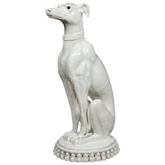 Italian Midcentury Porcelain Sculpture of a Greyhound Dog Sitting on a Cushion