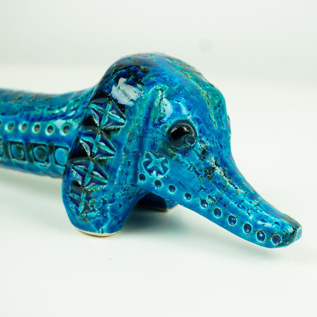 Charming iconic Italian modern ceramic Dachshund from the Rimini Blu series designed by Aldo Londi for Bitossi Italy.
The Italian Ceramic Artist Aldo Londi from Montelupo became Art Director of Bitossi in the early 1950s and created his famous