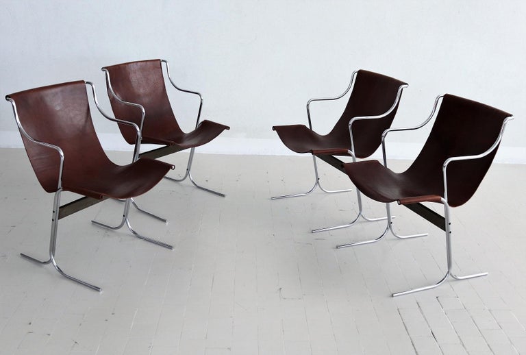Groovy set of four lounge chairs designed by Ross Littell and manufactured by ICF De Padova, Milan (approx. 1960s).
The lounge chairs are in minimalist style. 
In beautiful very good vintage condition the dark brown handcrafted leather, while the