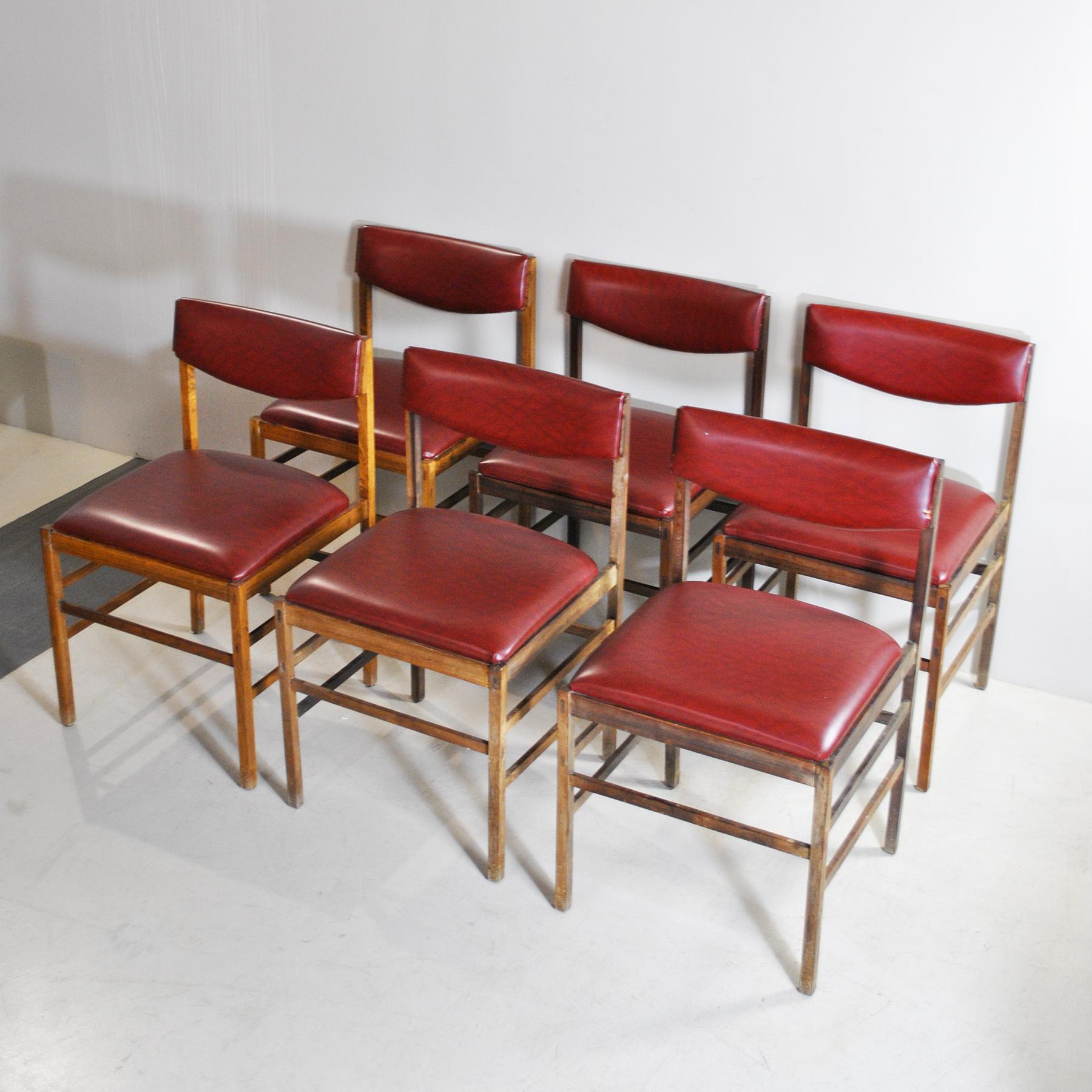 Six chairs in walnut wood with vinyl seat, Italian production from the late 1960s.