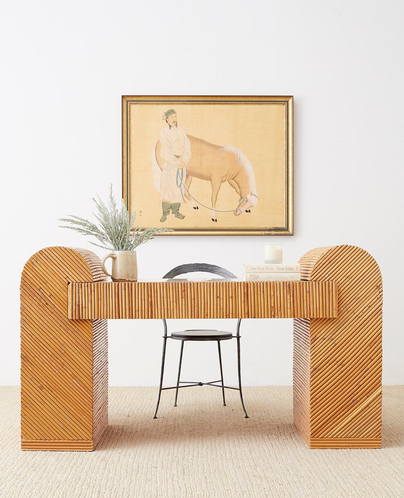 Exceptional Italian Mid-Century Modern three-piece writing table or desk. Constructed from a wooden frame crafted with split reed bamboo rattan. This desk represents everything wonderful about the use of rattan. Incredible geometric patterns abound