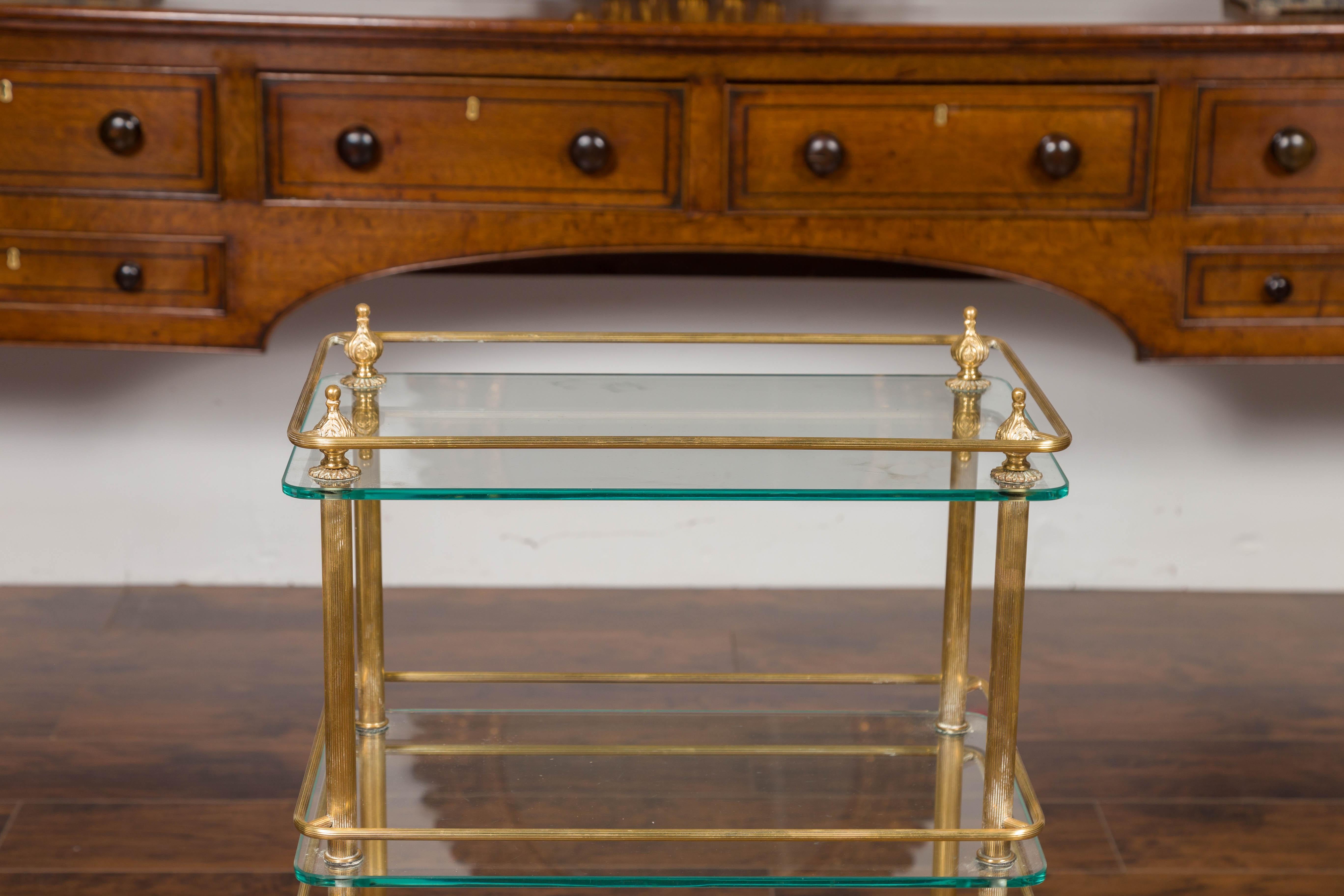 Italian Midcentury Tiered Brass Side Table with Glass Shelves and Petite Finials In Good Condition In Atlanta, GA