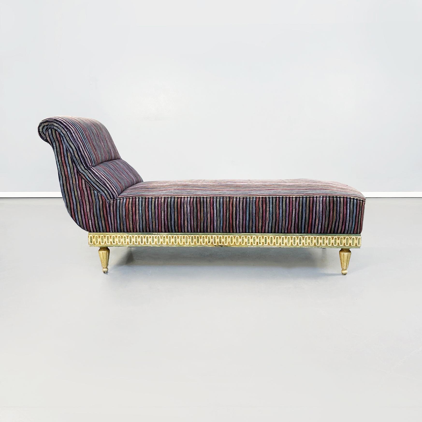 Italian mid-century Venetian style Chaise longue with Missoni striped fabric, 1950s
Chaise longue with rectangular seat and backrest upholstered and covered with multicolored striped fabric by Missoni. The underlying structure is in worked wood and